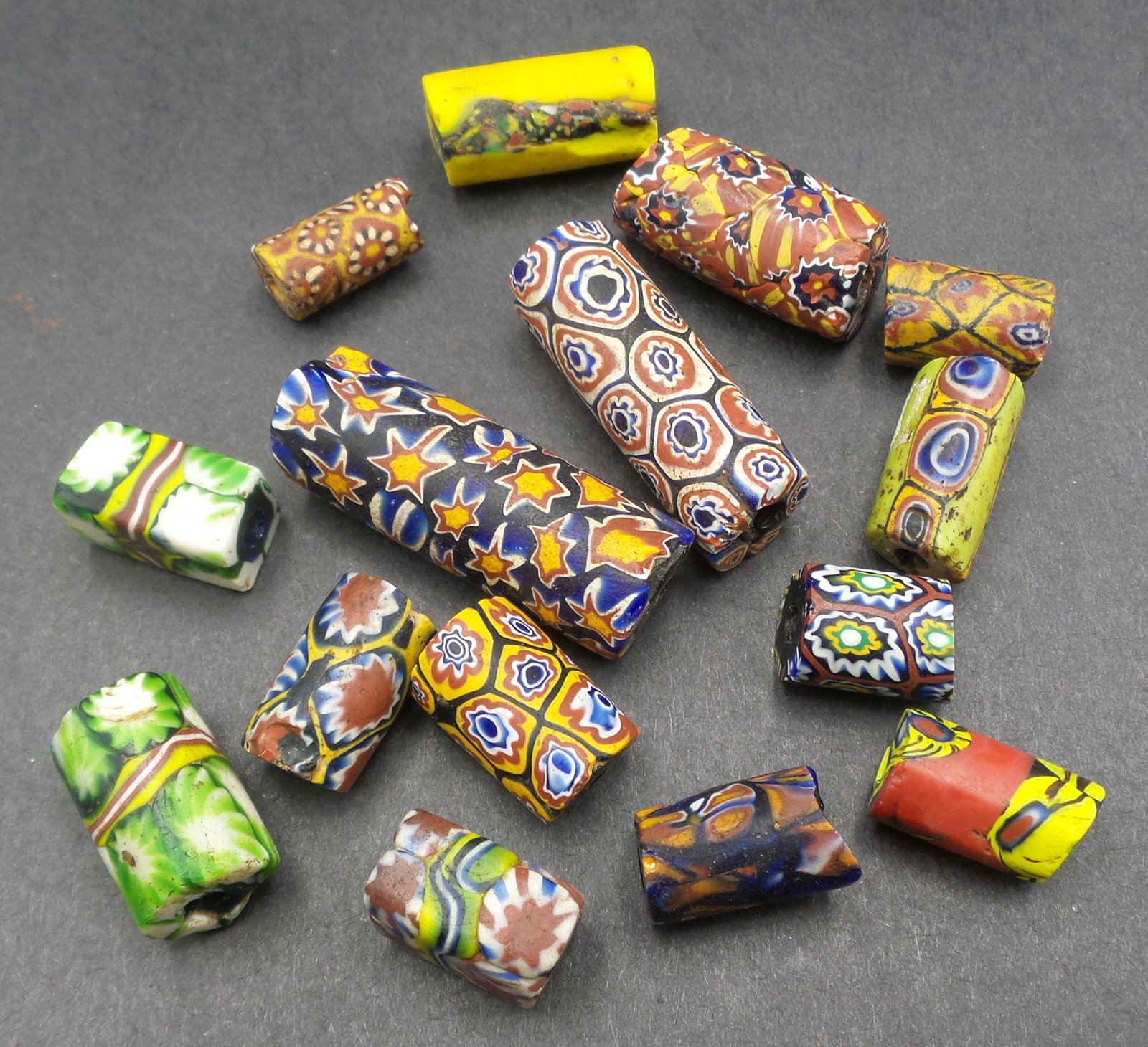 Lot of Antique Venetian Colored Glass African or Native American Trade Beads: Very good antique condition with no chips, cracks, or repairs. Uneven edges where the beads were broken off a larger rod which is normal. Largest piece measures approx. 1 3/8" long.