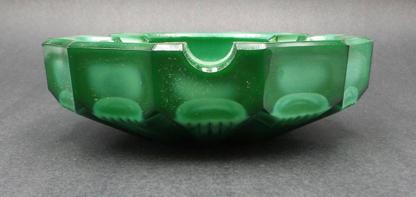 Vintage Bohemian Malachite Glass Ashtray: Very good vintage condition with no chips, cracks, or repairs. Measures 1 1/2" high x 5 1/8" in diameter. Minor wear according to age. Goldtone "Bohemia Glass - Made in Czechoslovakia" Sticker inside.