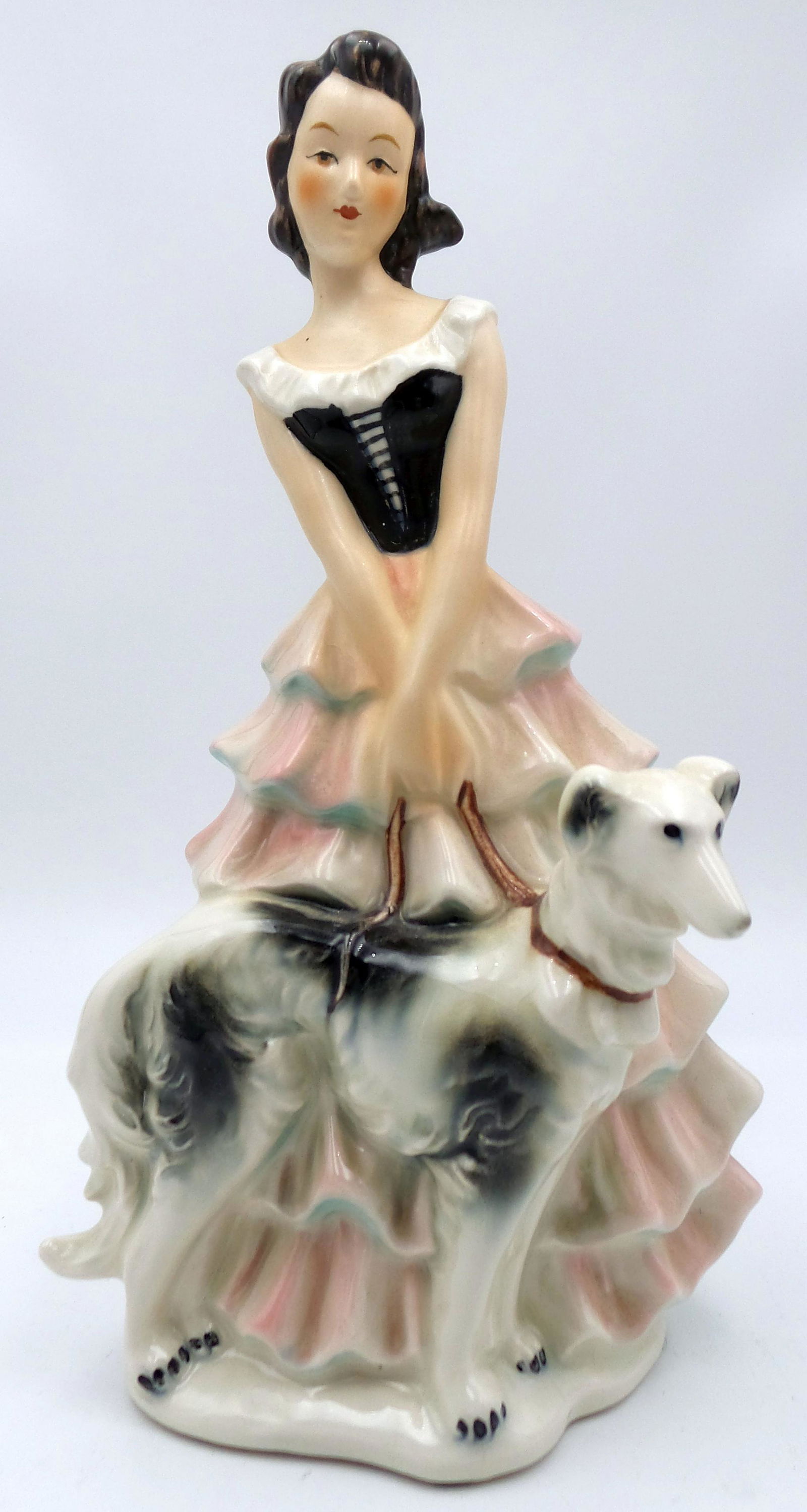 Vintage GOEBEL Germany Woman with Borzoi Dog Porcelain Figurine: Measures approx. 8" high x 4 3/4" wide (at the widest).