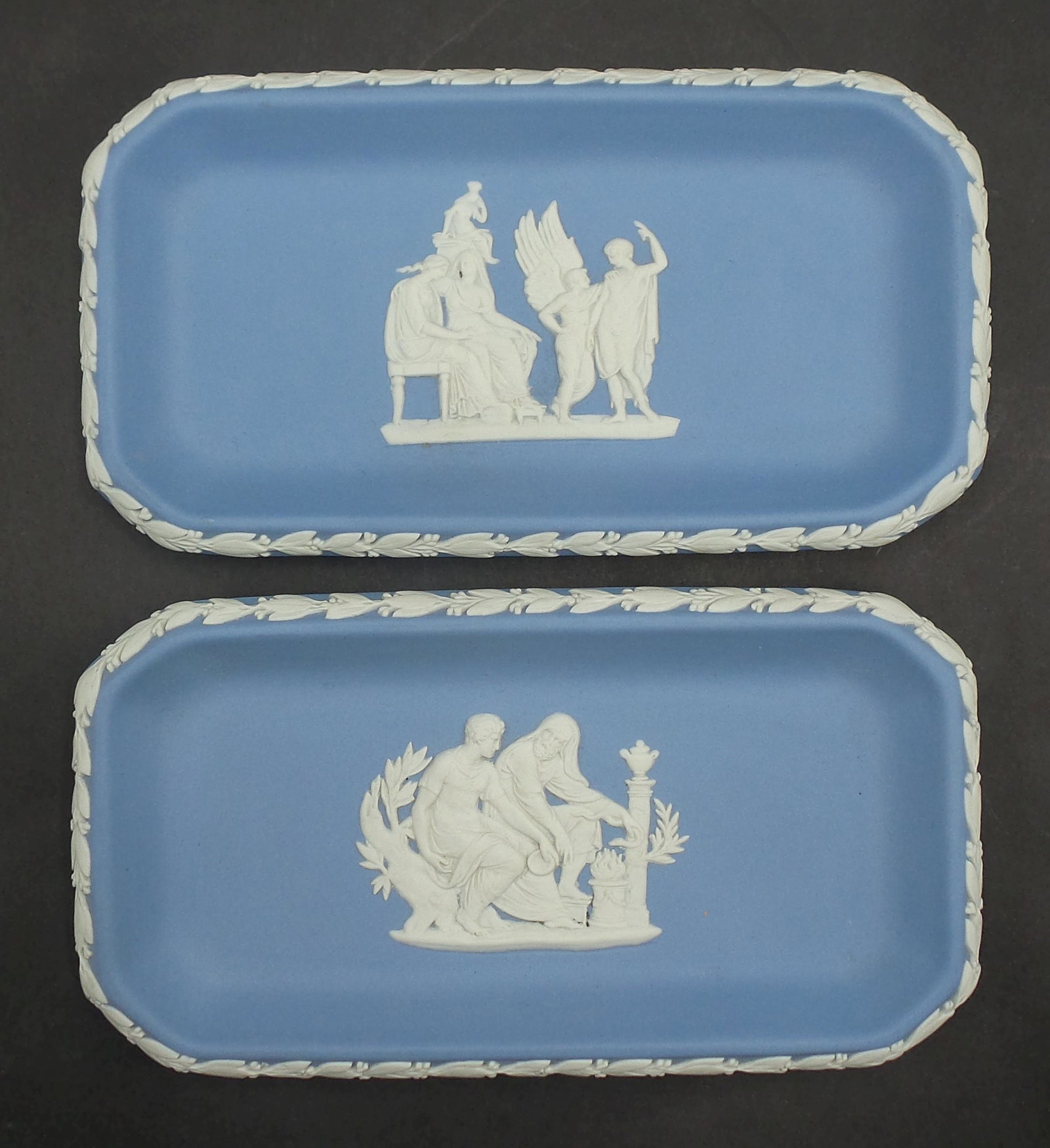 Pair of Vintage Wedgwood Blue Jasperware Trays: Each measures approx. 6" long x 3 1/4" wide. Very good vintage condition with no chips, cracks, or repairs. Signed on bottom.