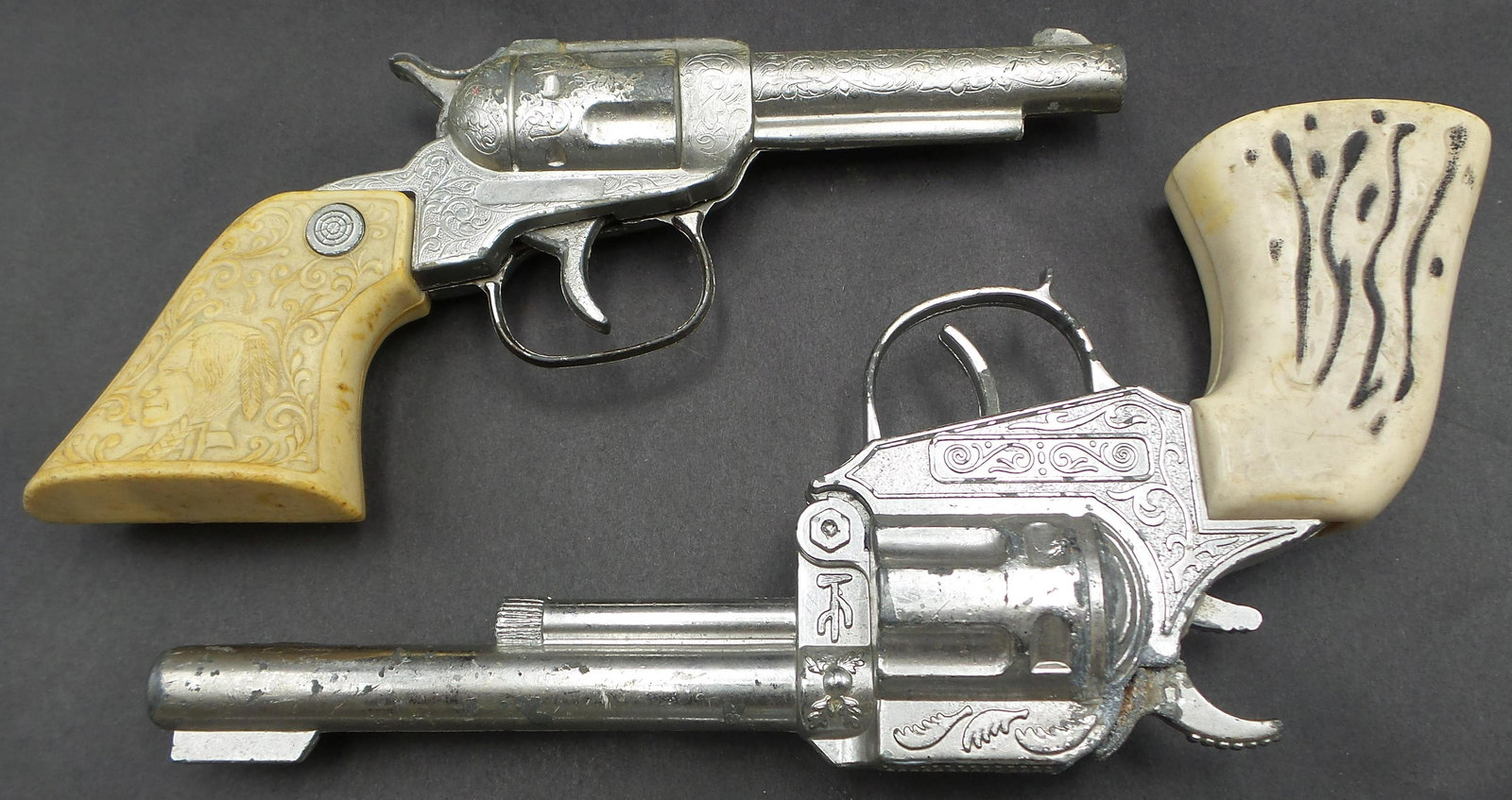 Lot of 2 Vintage Cap Gun Revolver Toys: Great lot in good vintage condition with wear according to age.