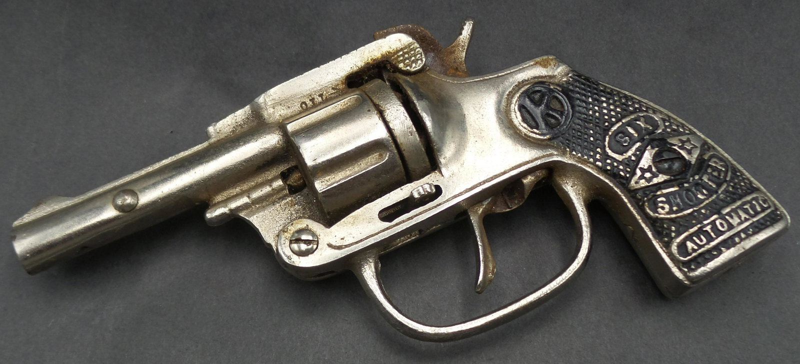 Rare 1930s KILGORE Six Shooter Cast Iron Cap Gun Toy: Made by Kilgore in 1935. Works and shoots disk caps. Measures approx. 7" long.