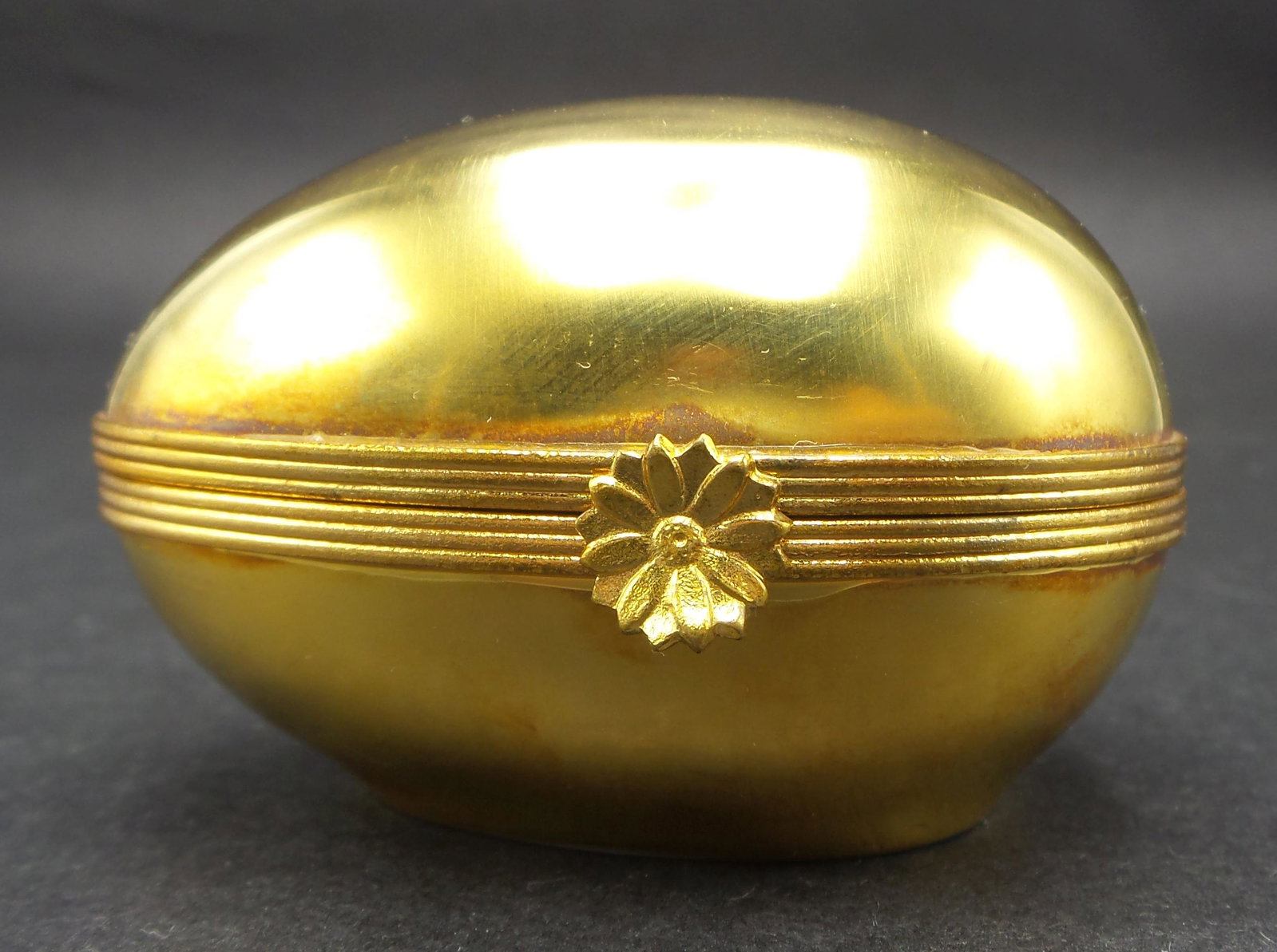 Vintage LIMOGES France 22K Gold Painted Porcelain Egg Trinket Box: Measures approx. 2 5/8" long x 2" wide. Very good vintage condition with no chips, cracks, or repairs.