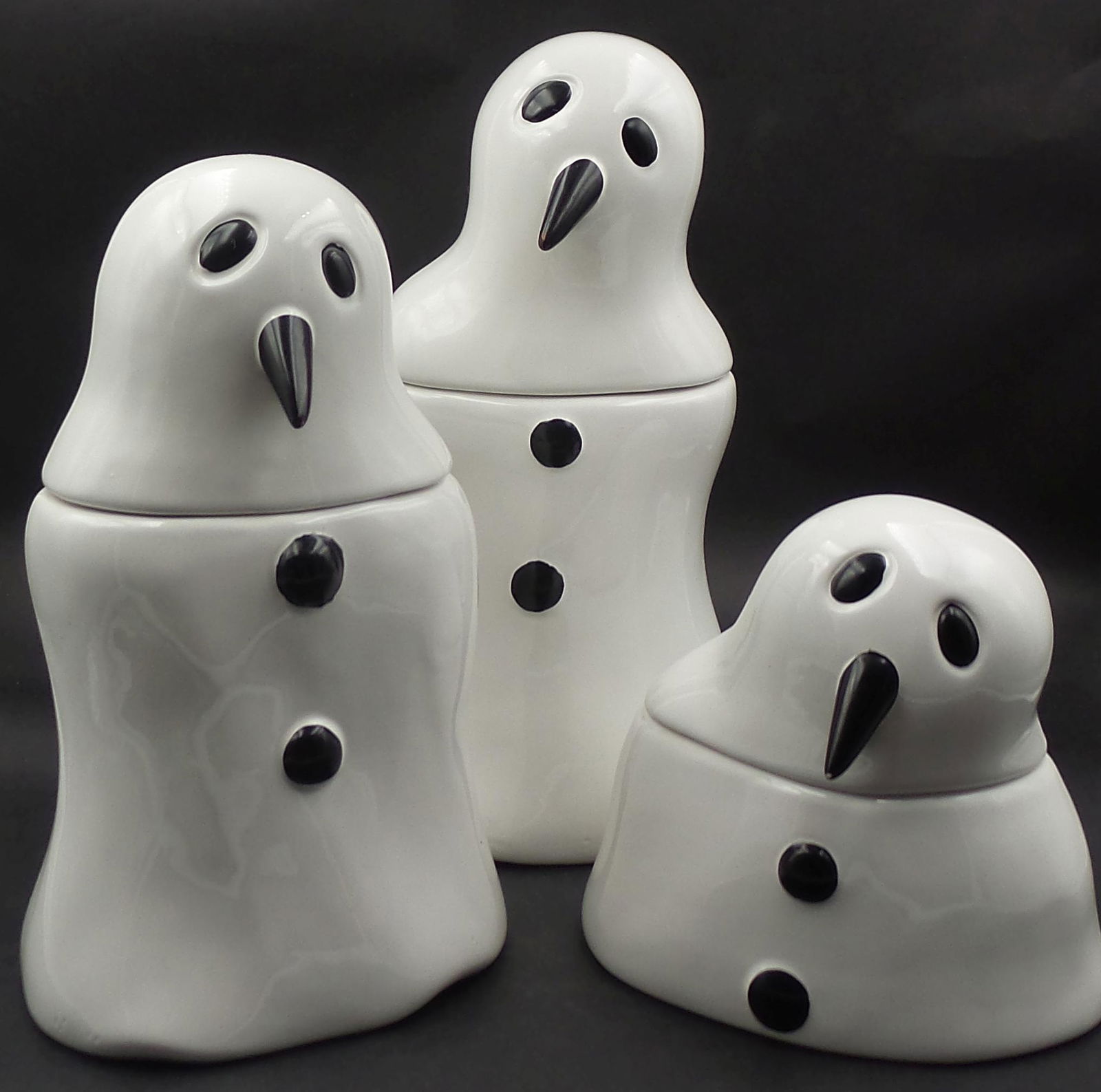 Set of 3 Rare Vintage MARCEL DZAMA Melting Snowmen Ceramic Canisters: Very good vintage condition with no chips, cracks, or repairs. The tallest piece measures approx. 8 1/2" tall. Very cool set!