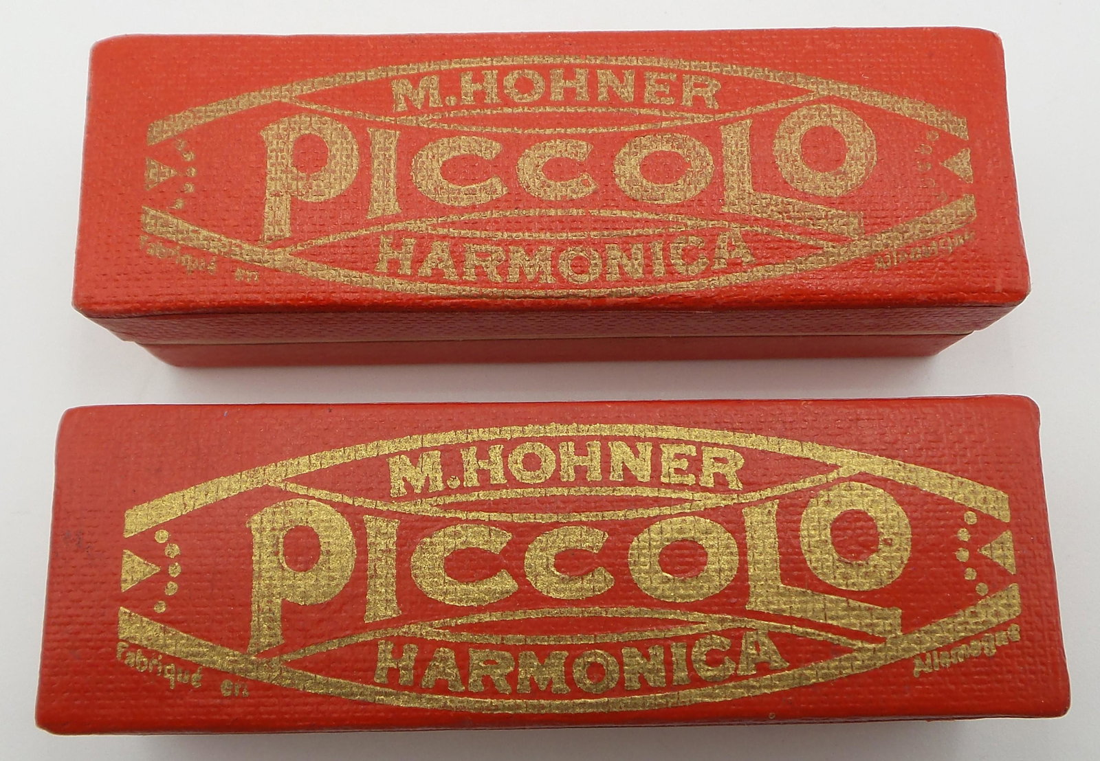 Pair of Vintage 1930s HOHNER Germany Piccolo Harmonicas: Box measures 3 1/2" long x 1 1/8" wide x 7/8" high. Very good vintage condition.