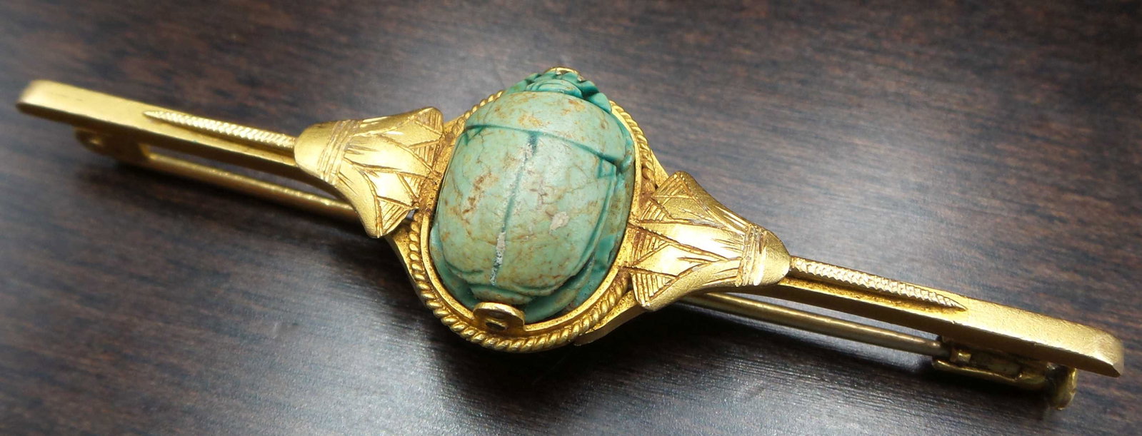 Ca. 1930 European 18K Gold & Ancient Faience Scarab Egyptian Revival Brooch: Incredible piece, ca. 1930. Features a genuine ancient Egyptian faience scarab mounted in an ornate and heavy 18K yellow gold frame with Lotus flower design. Measures approx. 2 1/2" long and weighs ca