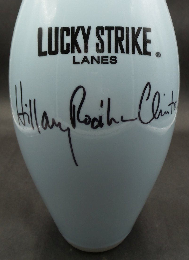Vintage LUCKY STRIKE Bowling Pin autographed by HILLARY CLINTON: This impressive piece is an original high-quality bowling pin with a wood core that was signed by Hillary Clinton during her iconic campaign events at bowling venues that were broadly covered by the p