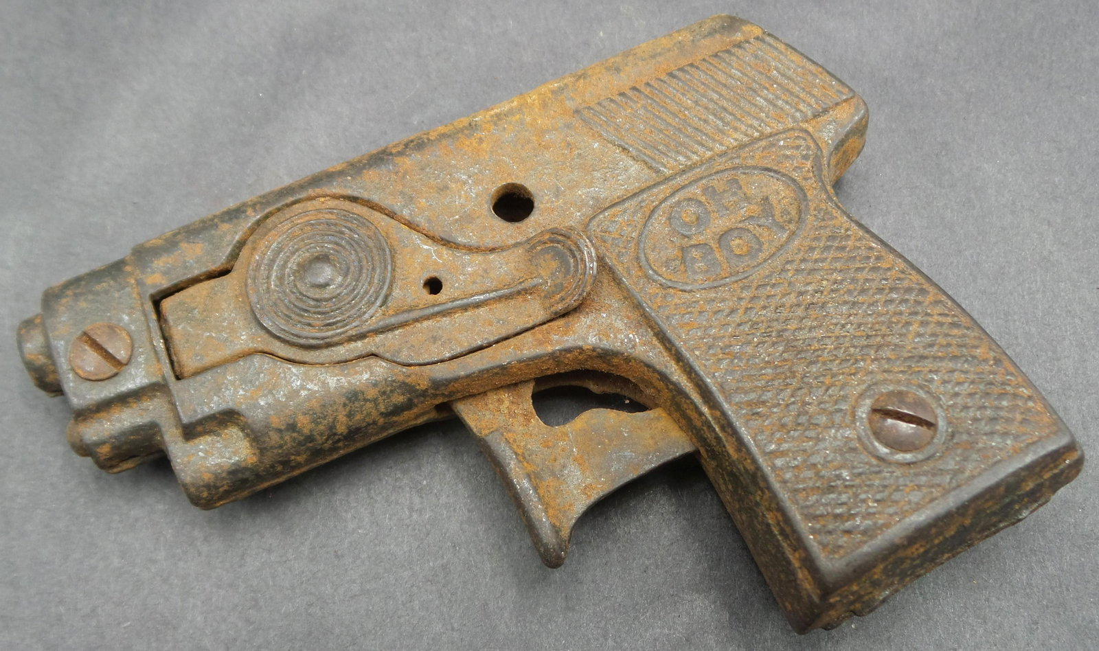 Vintage 1930s KILGORE Oh Boy Combination Repeater Cast Iron Cap Gun Toy: Good condition with wear and some surface corrosion according to age. Measures approx. 4 1/4" long. Trigger works but seems to need a new spring.