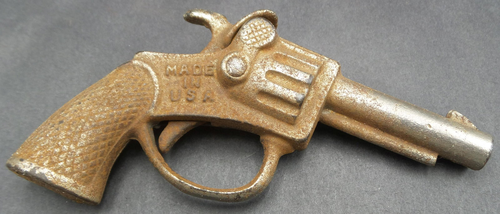 Vintage 1930s STEVENS Echo Cap Gun Toy: Made by Stevens around 1930. Good working condition with some surface rust according to age. Measures approx. 4 1/4" long.