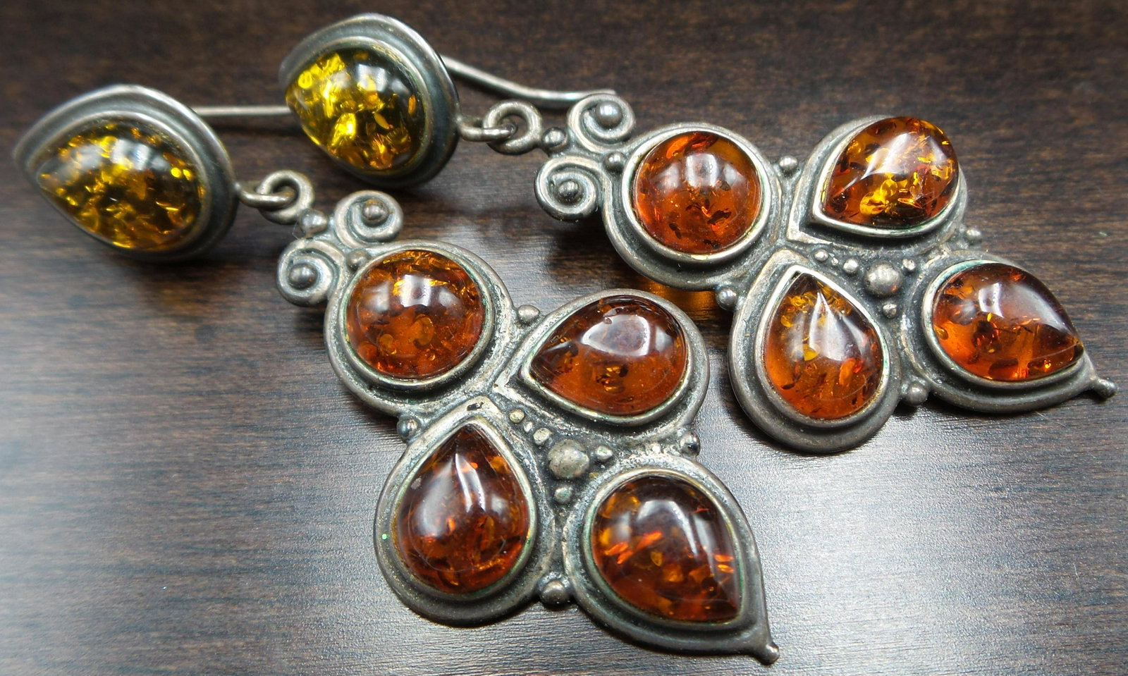 Vintage Pair of of Sterling Silver & Amber Chandelier Earrings: Beautiful pieces. Each measures approx. 2 1/4" long x 7/8" wide and weighs ca. 6.1 grams. Very good vintage condition with no damage and only minor wear. Stamped "925" for Sterling Silver.