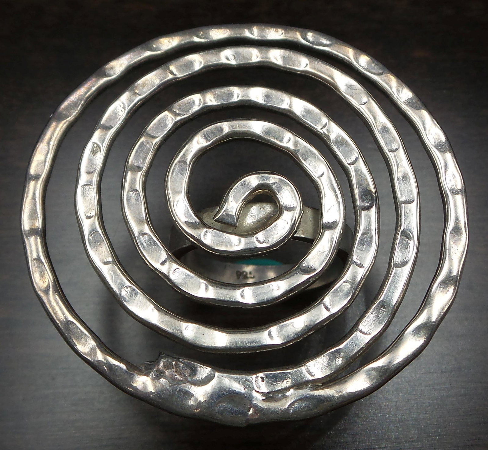 Unusual Large Vintage Mid-Century Sterling Silver Spiral Ring: This beautiful studio ring features a very large sprial on top of the shank. The large spiral measures approx. 1 3/4" in diameter, the ring is a size 8 and weighs ca. 20 grams. Stamped "925" for Sterl