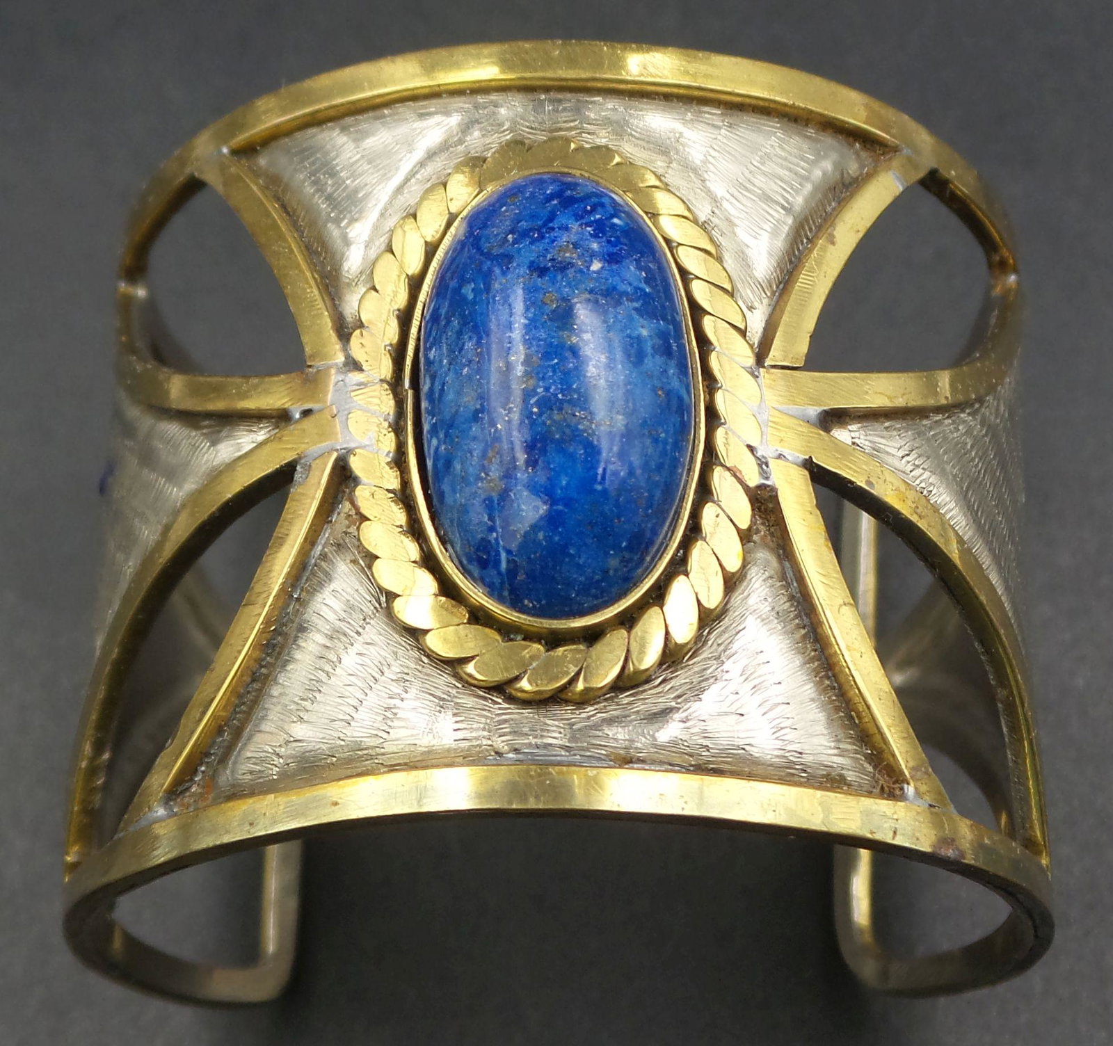 Vintage MORITA GIL Chile Hand Made Metal & Lapis Lazuli Costume Jewelry Designer Bracelet: Measures approx. 1 7/8" wide x 2 3/16" in diameter (at the widest). Can be bent to be enlarged. Very good vintage condition with no chips, cracks, or repairs. Signed.