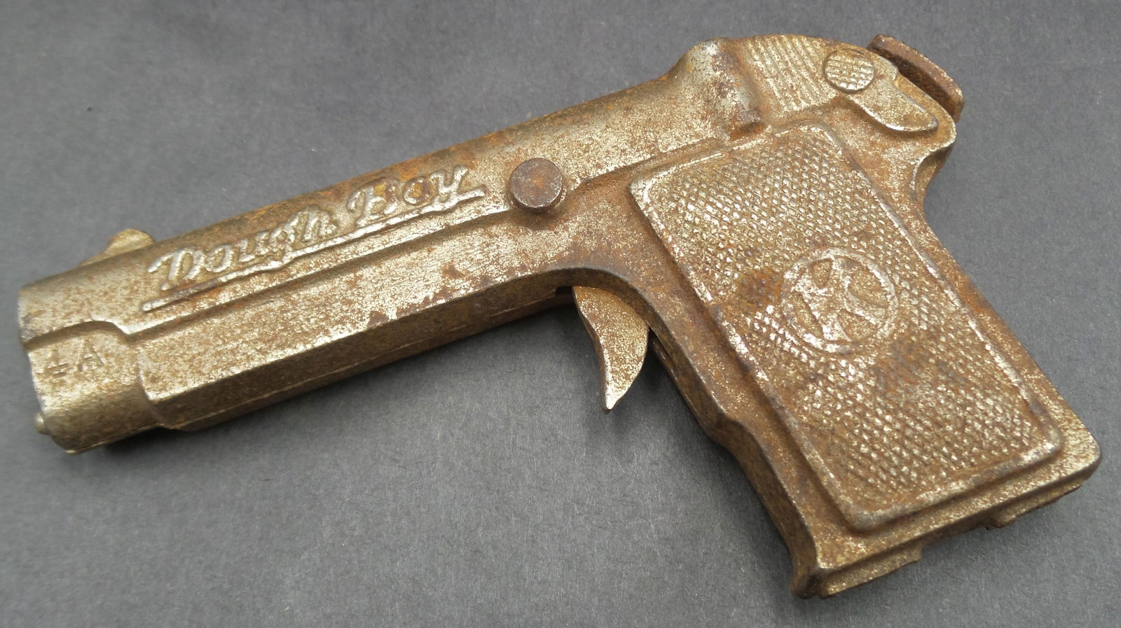 Antique 1920s KILGORE Dough Boy Cast Iron Cap Gun Toy: Made by Kilgore around 1920. Needs a new spring. Measures approx. 5" long.