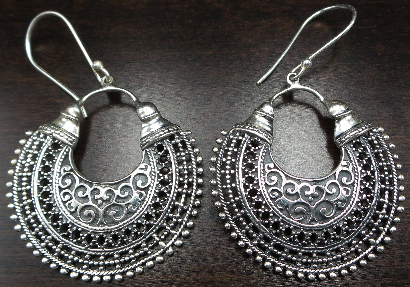 Pair of Vintage Vermeil Sterling Silver Chandelier Earrings - Signed: Beautiful large pieces with a pierced design. Very good vintage condition with some patina according to age. Each measures approx. 1 1/2" in diameter and weighs ca. 7.5 grams. Marked "925" and carryin