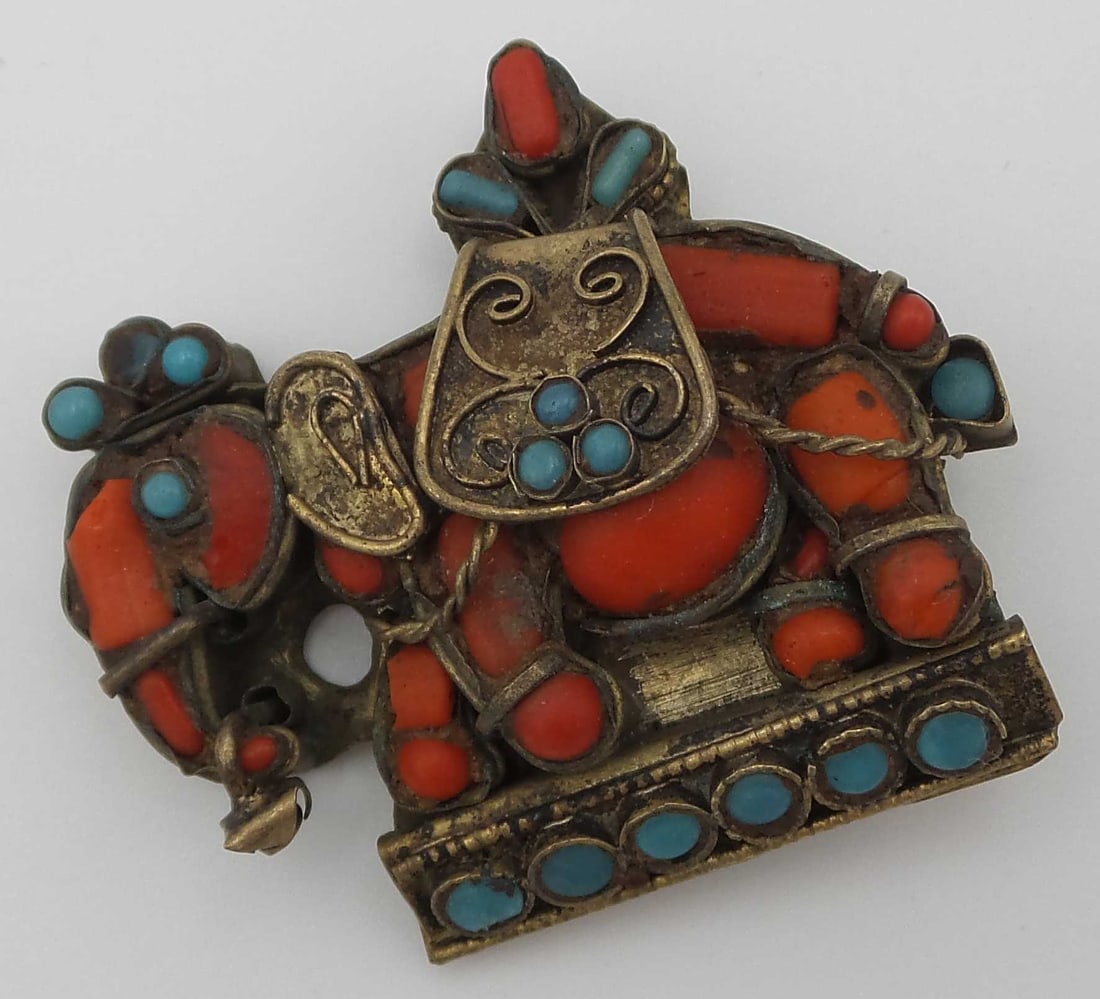 Antique Tibetan Brass, Red Coral and Turquoise Elephant Brooch: Measures 1 7/8" W x 1 5/8" H.