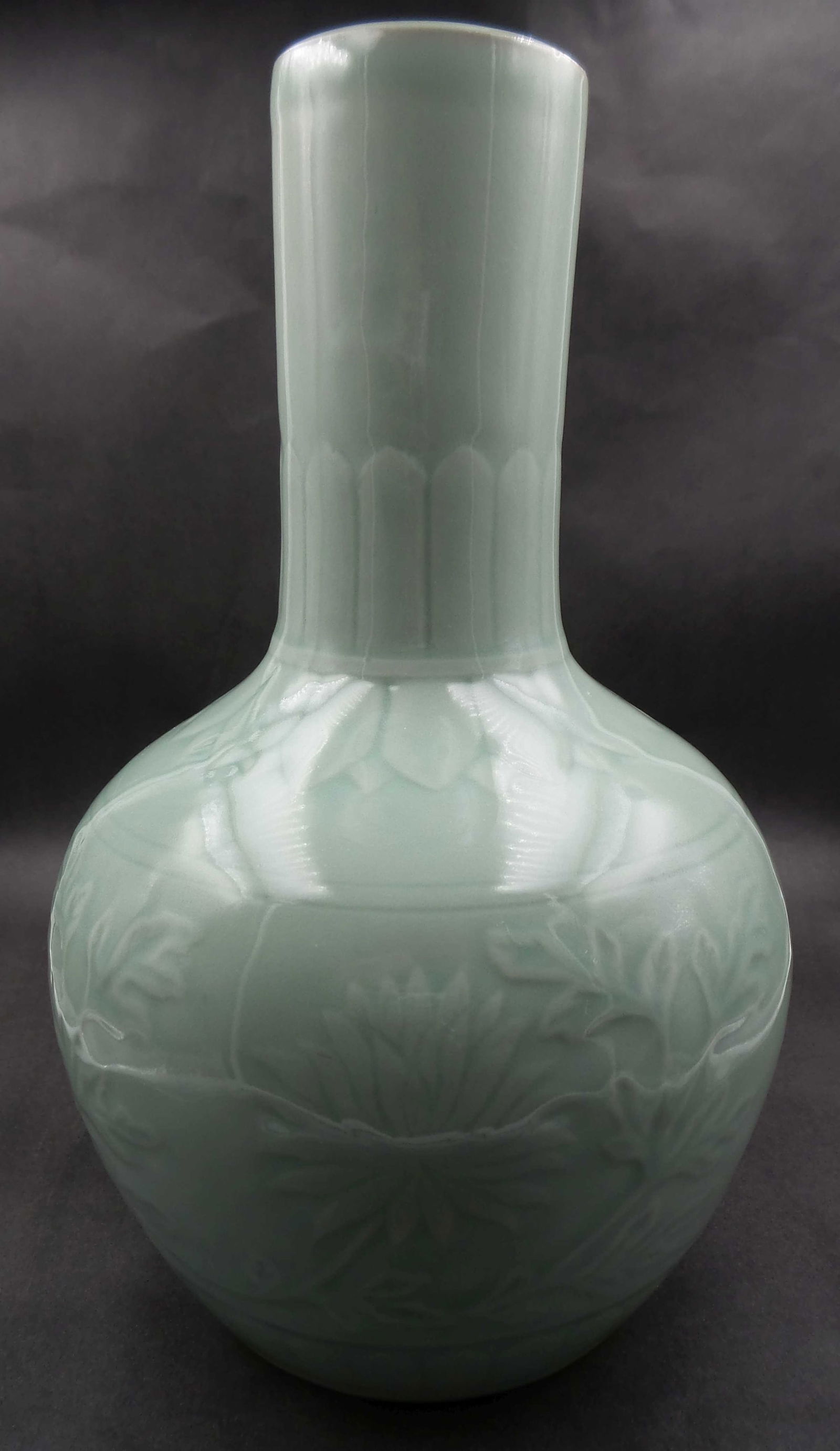 Beautiful Antique Chinese Greenish-Blue Celadon Vase: Very good antique condition, no chips, cracks, or repairs. Some discolaration on one side from a firing / production issue. Measures approx. 10 1/2" tall.