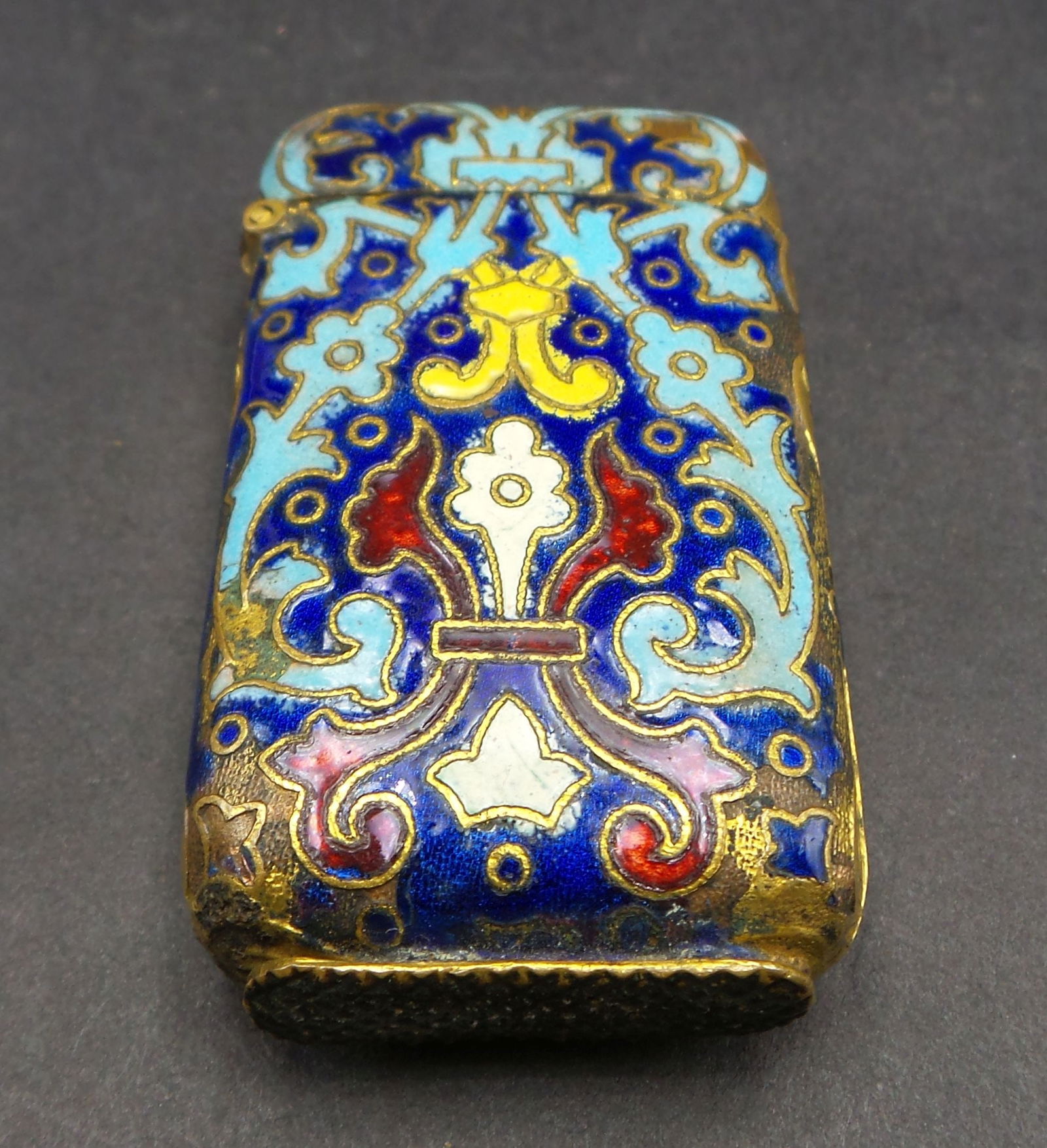 Antique Cloisonne Matchbox Match Case /w Spring Loaded Lid: Very good condition with only minor enamel loss. Measures approx. 2" long. The lid opens and closes nicely.