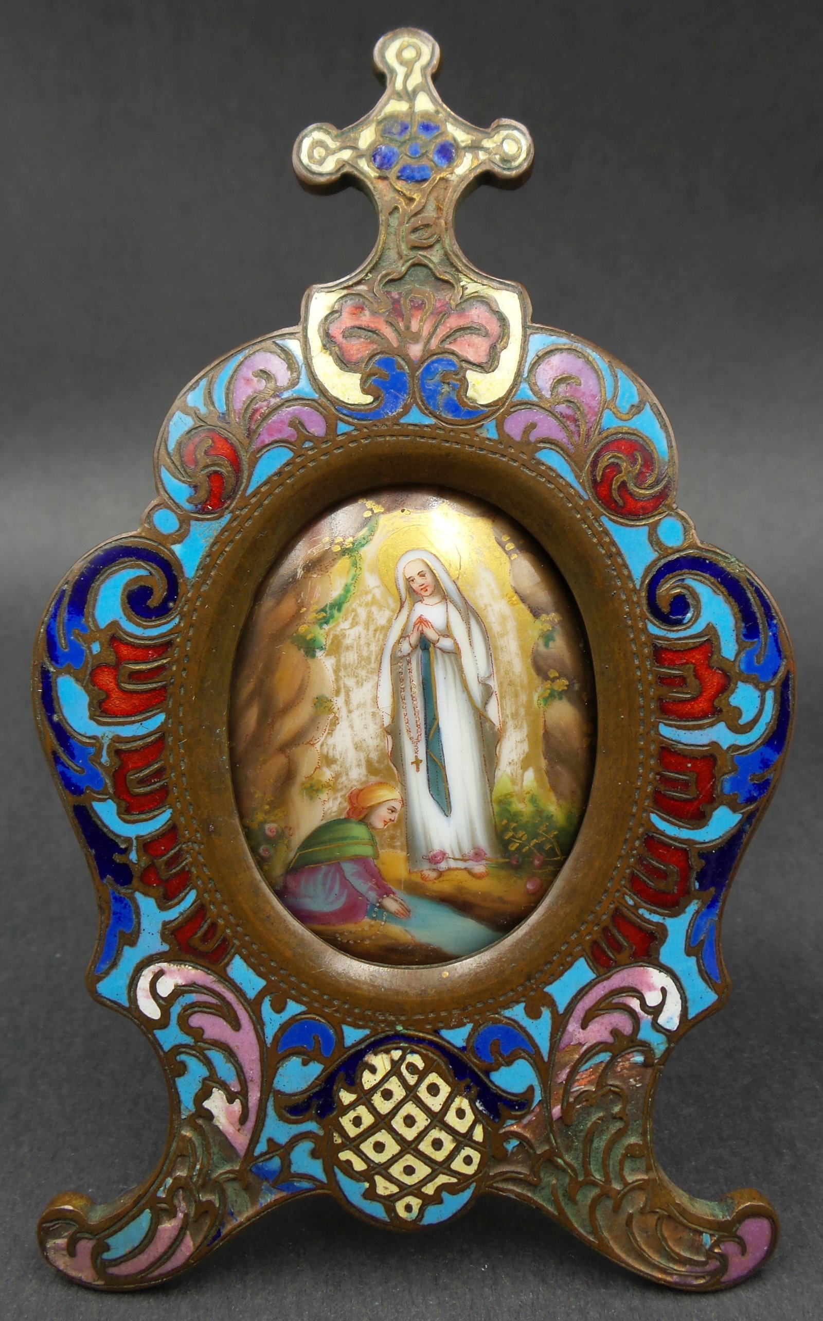 Ca. 1900 European Hand Painted Virgin Mary Porcelain Plaque in Cloisonne Enamel Frame: Very good antique condition with minor enamel loss. Measures approx. 4 1/2" high x 2 3/4" wide. Incredible piece!