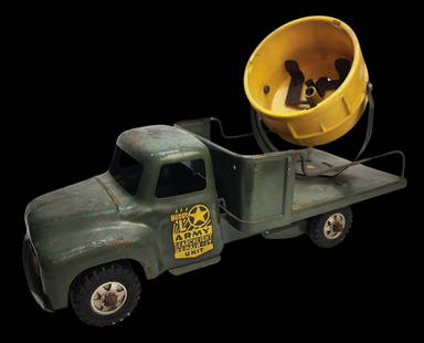 Vintage BUDDY L Pressed Steel US Army Searchlight Toy Truck: All original with nice paint and decal; missing the bulb and lens. Measures approx. 14 1/2" long.