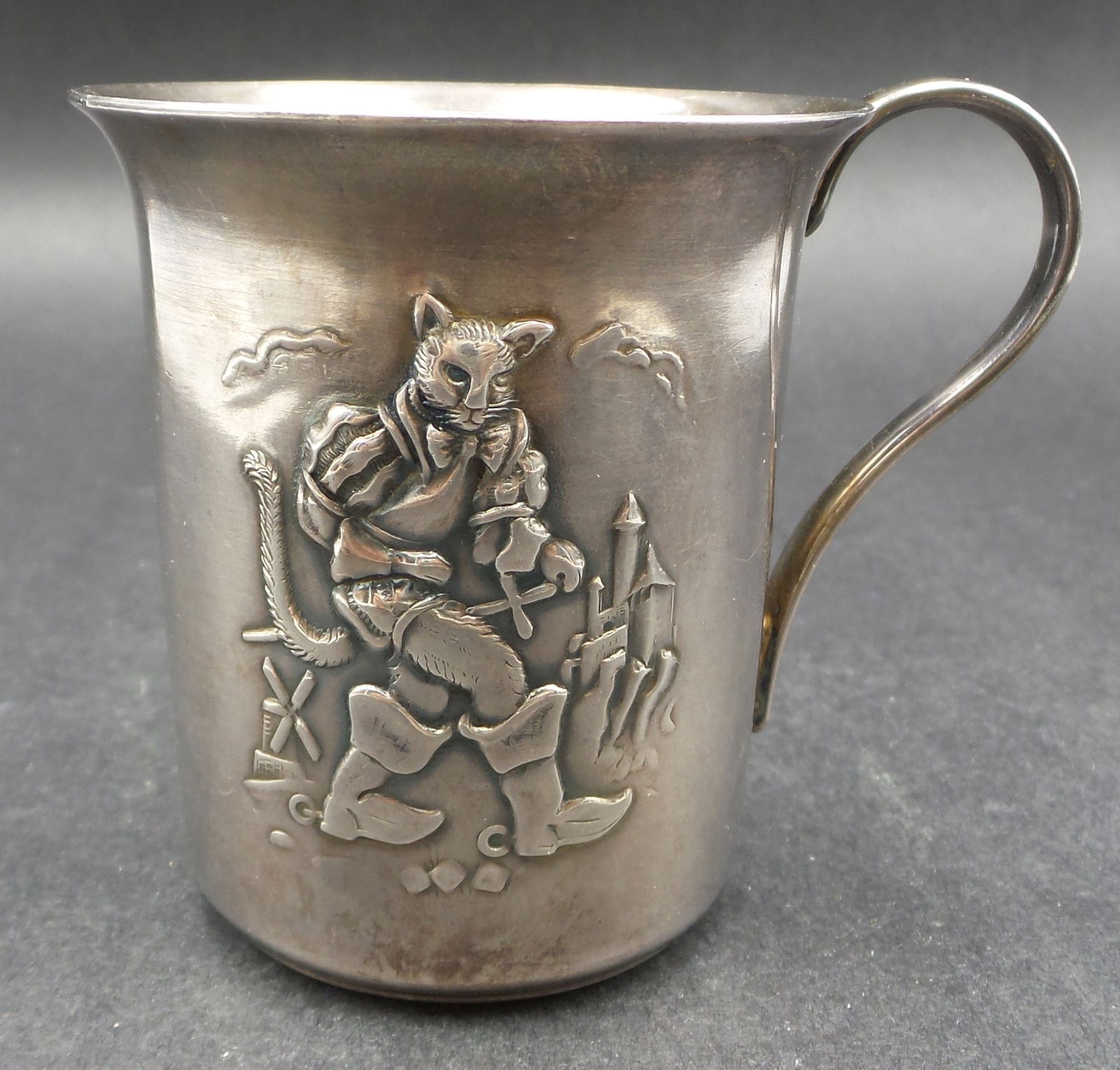Rare Antique European Silverplate Puss-in-Boots Fairytale Cup - Marked: Very good antique condition with minor wear according to age. Measures approx. 2 5/8" tall x 2 1/4" in diameter (top rim). Marked on the bottom.