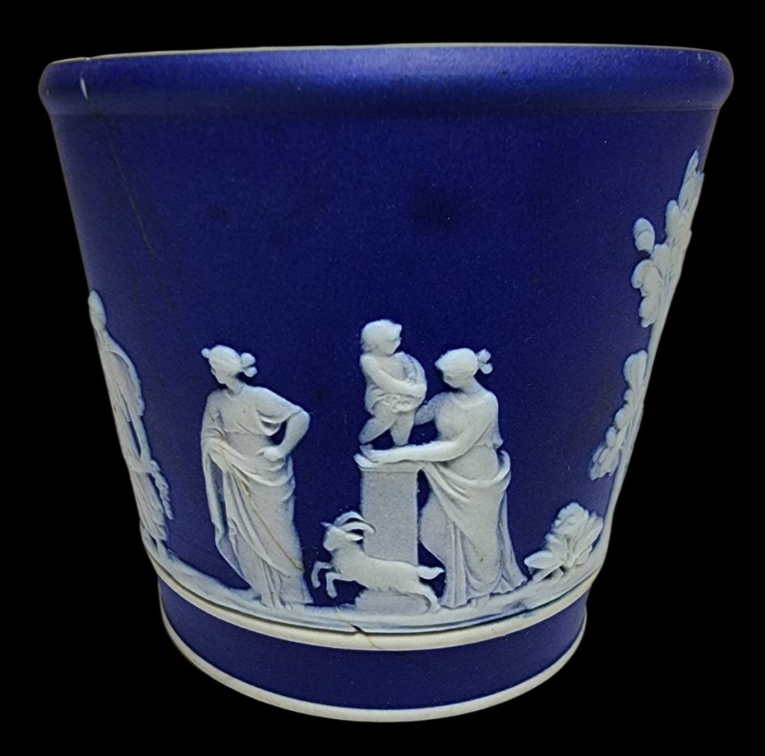 Antique WEDGWOOD Jasperware Deep Blue Beaker or Planter: A deep blue Wedgwood beaker of planter featuring neoclassical scenes. Good antique condition; one crack. Measures approx. 2 3/4" high x 3" in diameter. Marked "Wedgwood Made in England". Provenance: F