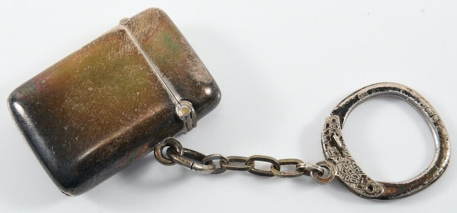 Antique ca. 1900 British Sterling Silver "Keychain" Matchbox: This beautiful little matchbox on a "keychain" was made around the early 1900s in Great Britain. It is in very good antique condition with some patina according to age, measures approx. 1 5/8" long x