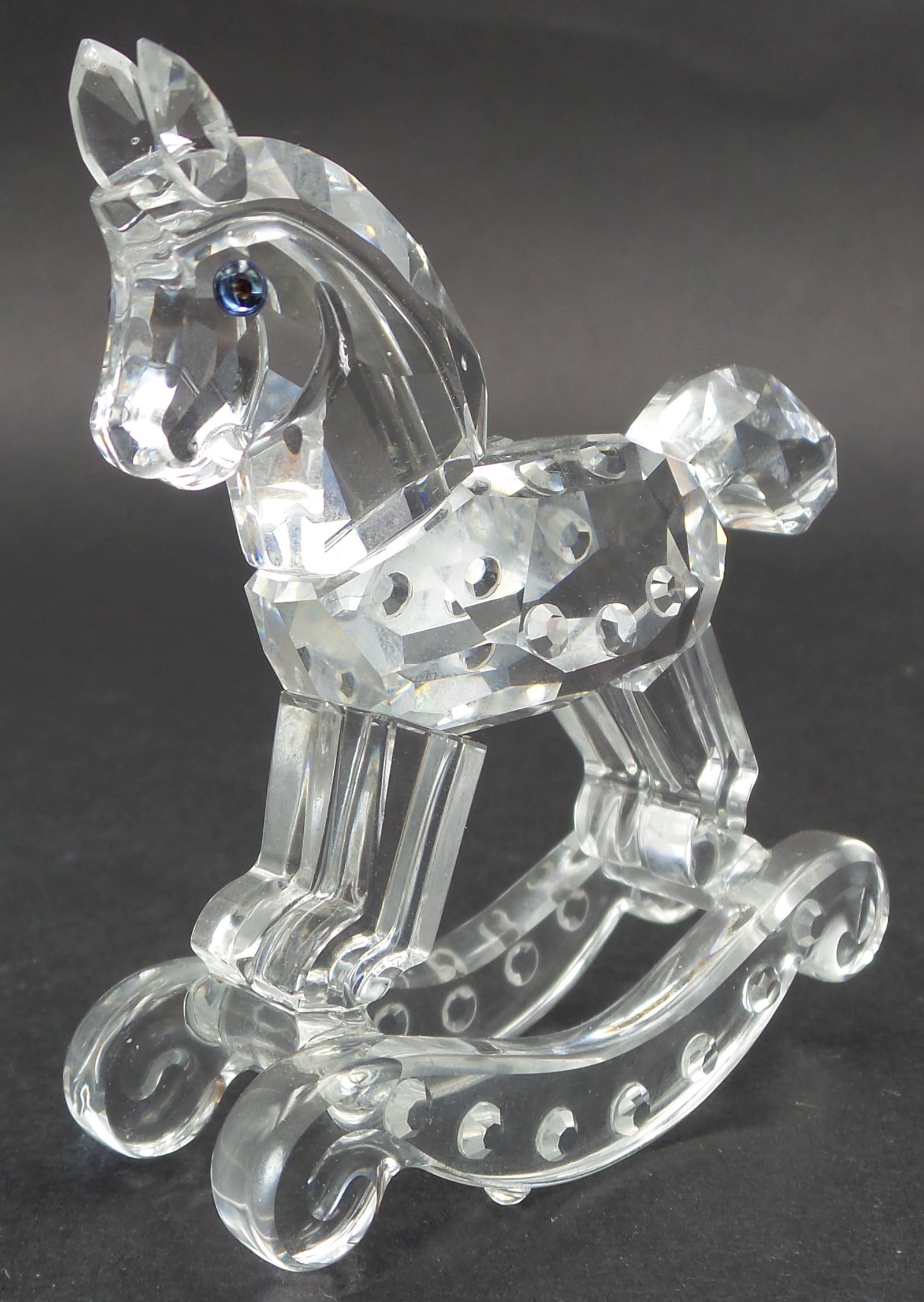 Vintage SWAROVSKI Silver Crystal Rocking Horse Figurine: Good vintage condition; tiny chip to the tip of one leg; no cracks, or repairs. Signed. Measures approx. 1 5/8" high x 1 3/4" wide x 1 3/8" deep.