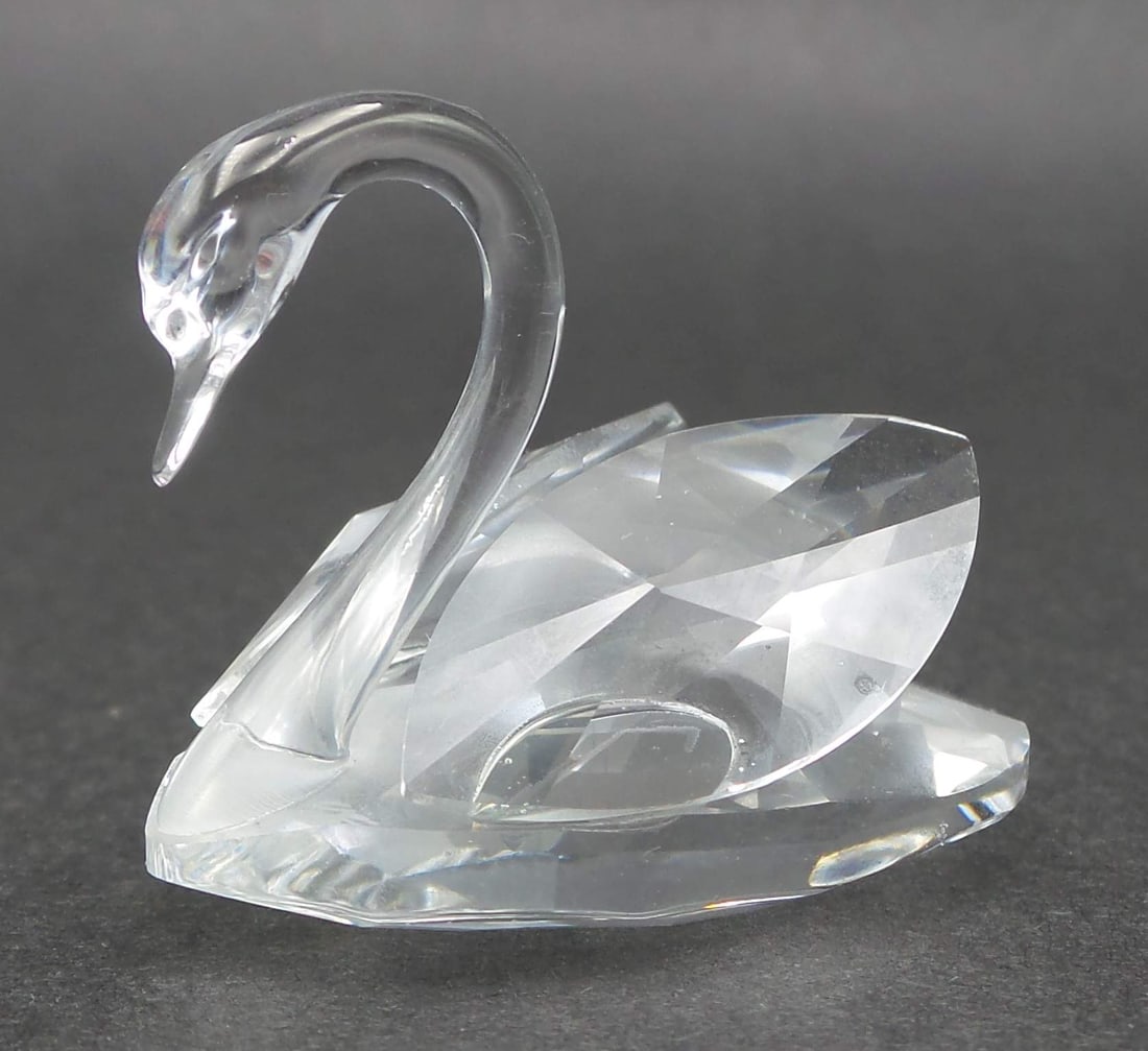 Vintage SWAROVSKI Silver Crystal Swan Figurine: Very good vintage condition; no cracks, or repairs. Very small flea bite on the back edge. Some dust is making the crystal seem a little dull on the pictures but that can be cleaned away easily. Minor