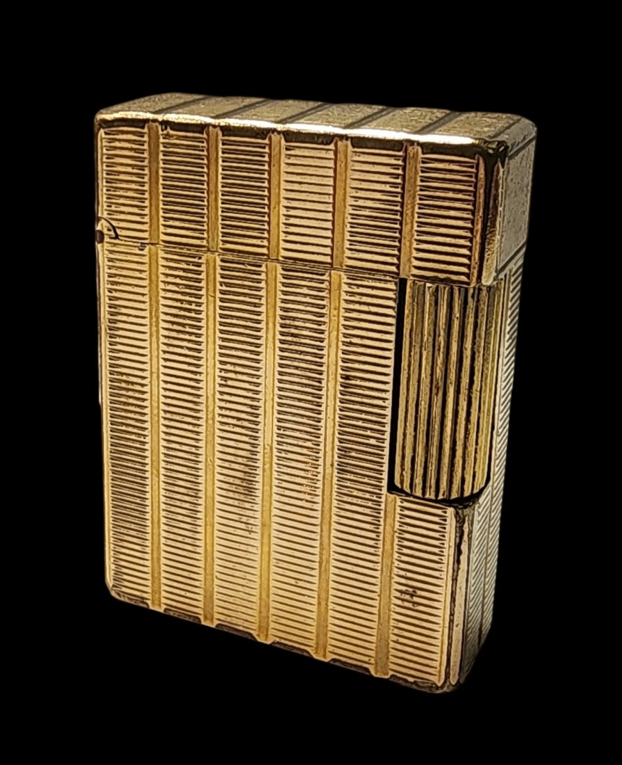 Rare Vintage S.T. DUPONT "Line 1" 20 Micron Gold Plated Luxury Lighter: This stylish and heavy vintage lighter was made by luxury accessory maker Dupont around the 1980s and features 20 microns thick gold plated steel surfaces with cut horizontal lines. Good vintage condi