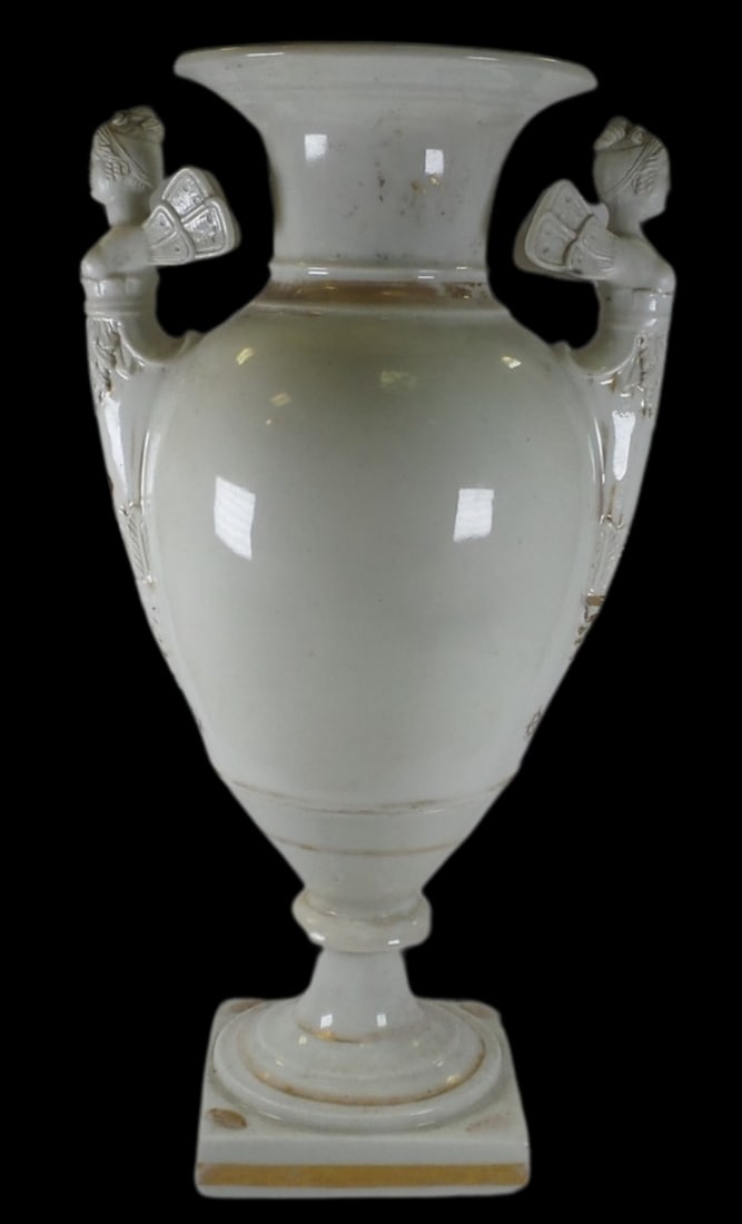 Antique 19th Century European Gold Painted White Porcelain Urn /w Anthropomorphic Handles: An antique European gold painted white porcelain urn. Probably made in France in the mid- to late 19th Century. Mythical winged harpie figures as handles. Good antique condition with some wear and fad