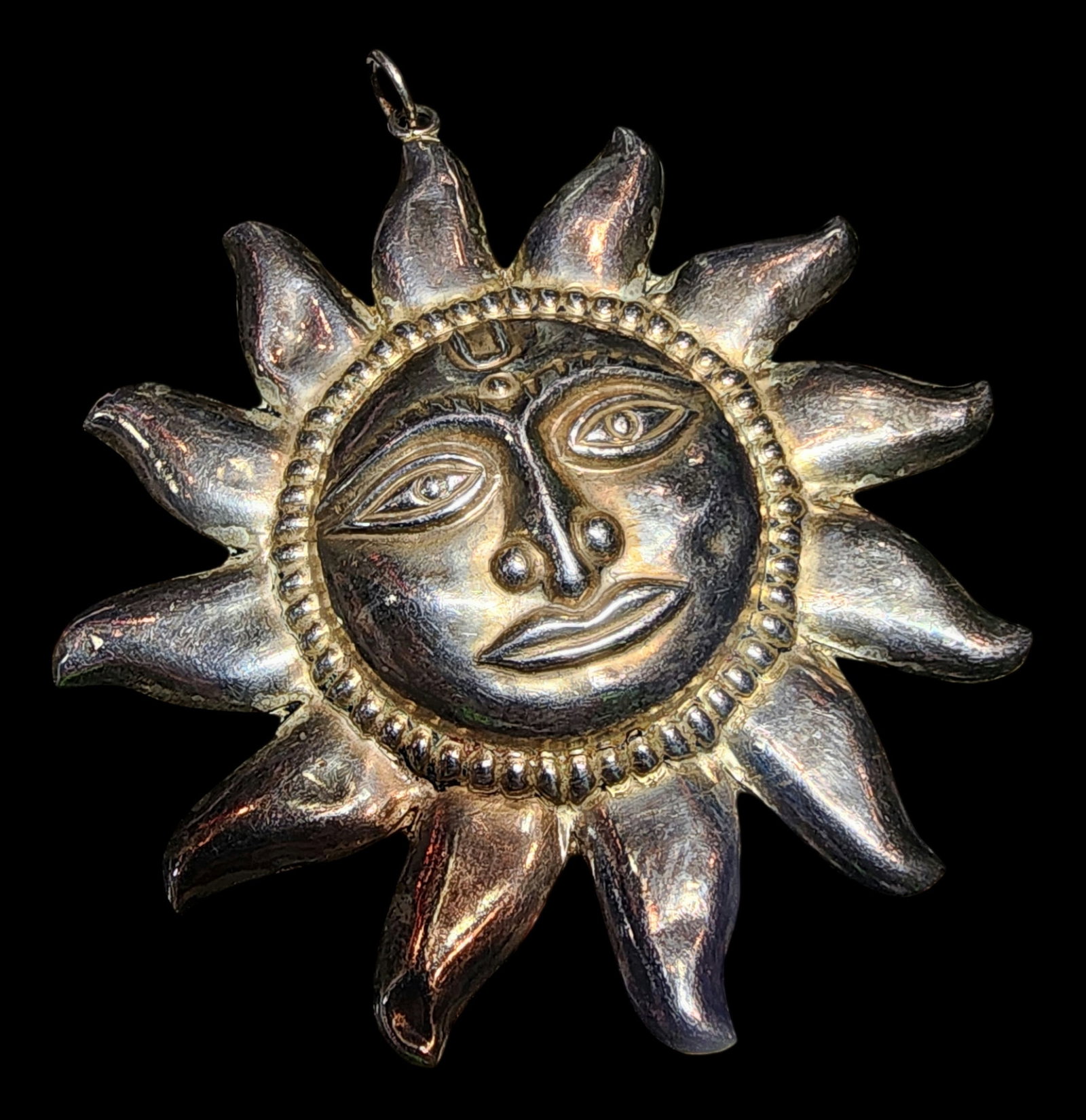 Large Vintage Handmade Sterling Silver Sun Pendant: Masterfully crafted piece in very good vintage condition with minor patina according to age; one dent to one of the sun rays. Measures approx. 2 3/4" in diameter and weighs ca. 17.9 grams. Marked on t