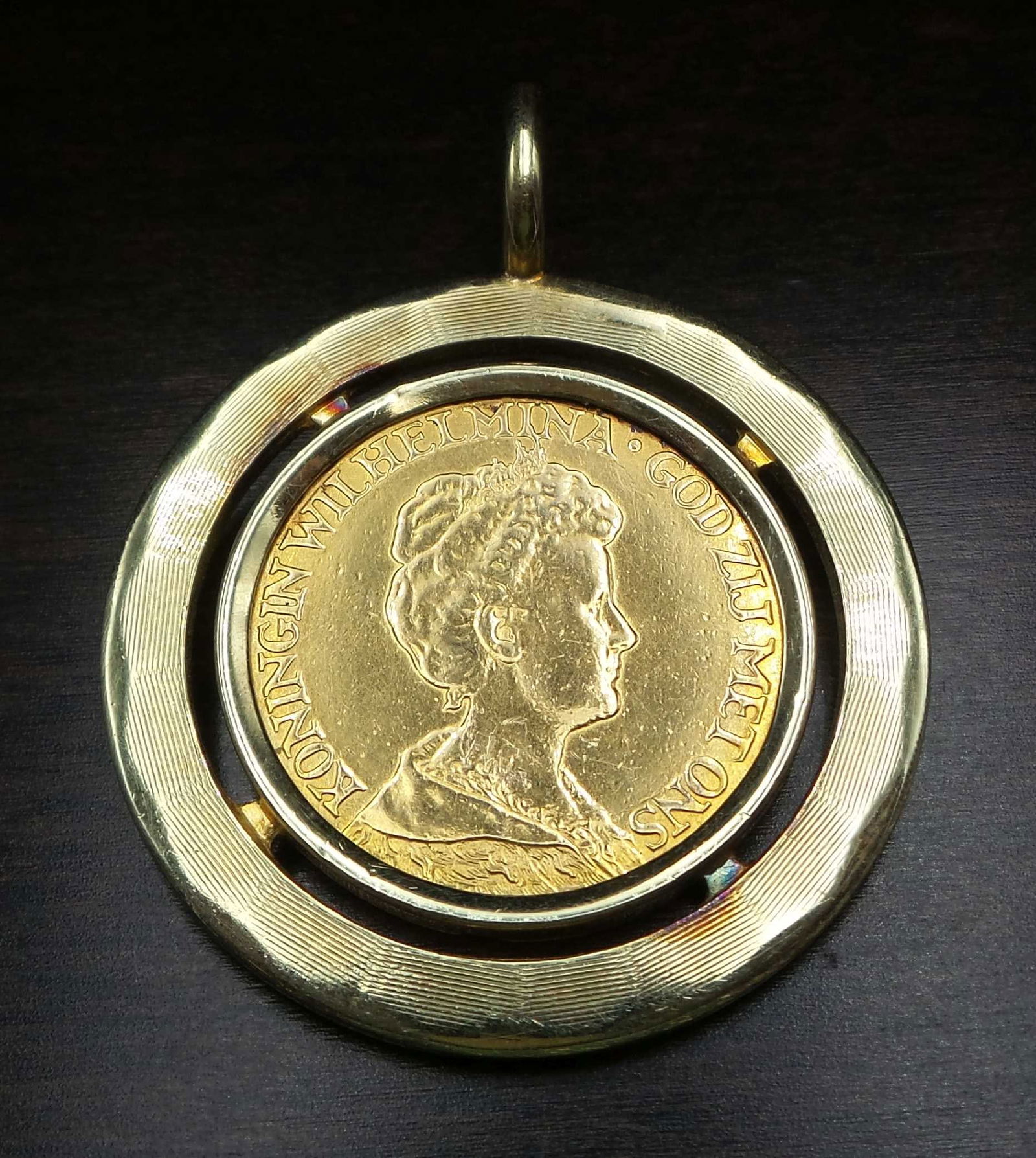 Antique 14K Gold & 1917 Dutch 10 Gulden Gold Coin Pendant: The coin weighs approx. 6.7 grams with a gold fineness of 0.900 (90%) representing a fine gold weight of ca. 0.2 oz. The coin measures approx. 7/8" in diameter, the pendant itself measures 1 1/4" in d