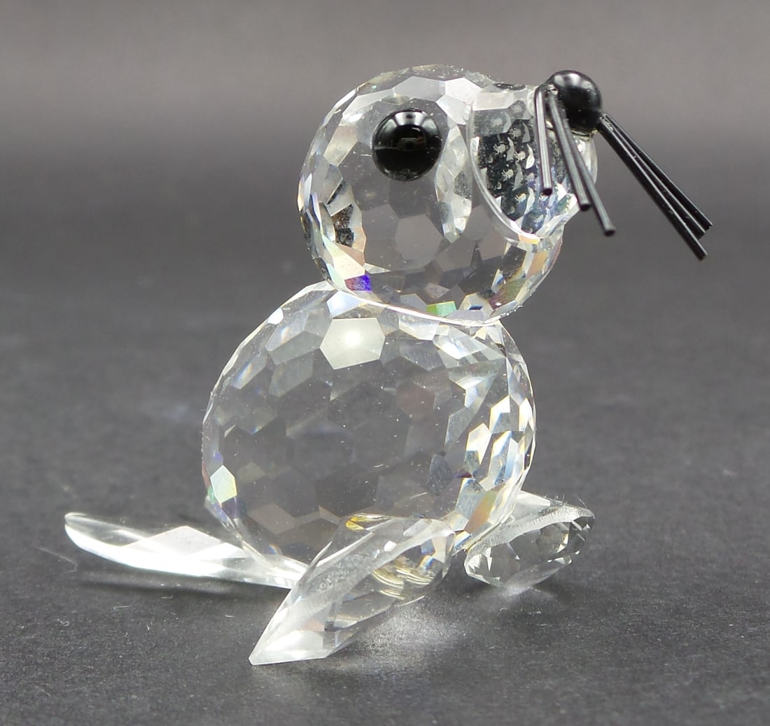Vintage Pre-1989 Discontinued SWAROVSKI Silver Crystal Baby Seal Figurine: Very good vintage condition; no chips, cracks, or repairs. Signed. Measures approx. 1 5/8" high x 1 3/4" wide x 1 3/8" deep.