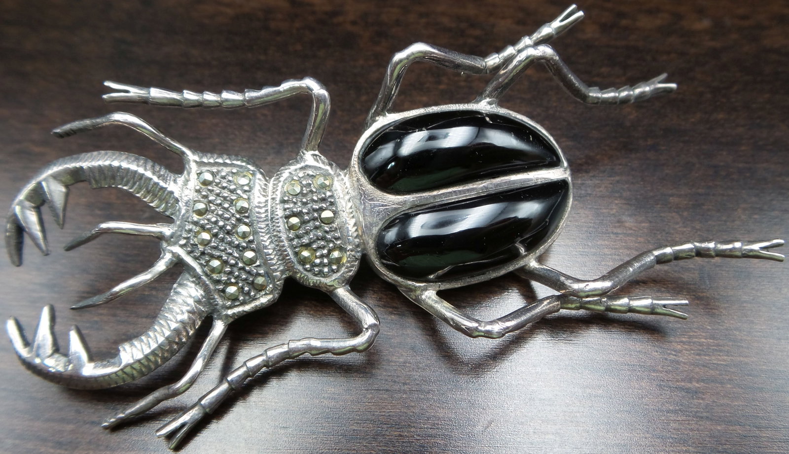 Large & Very Unusual Vintage Sterling Silver & Black Onyx Beetle Brooch: Very unusual, large, and beautiful piece. Very good vintage condition; minor patina according to age. Measures approx. 2 1/2" long x 1 1/8" wide, and weighs ca. 12.6 grams. Marked "925" for Sterling S