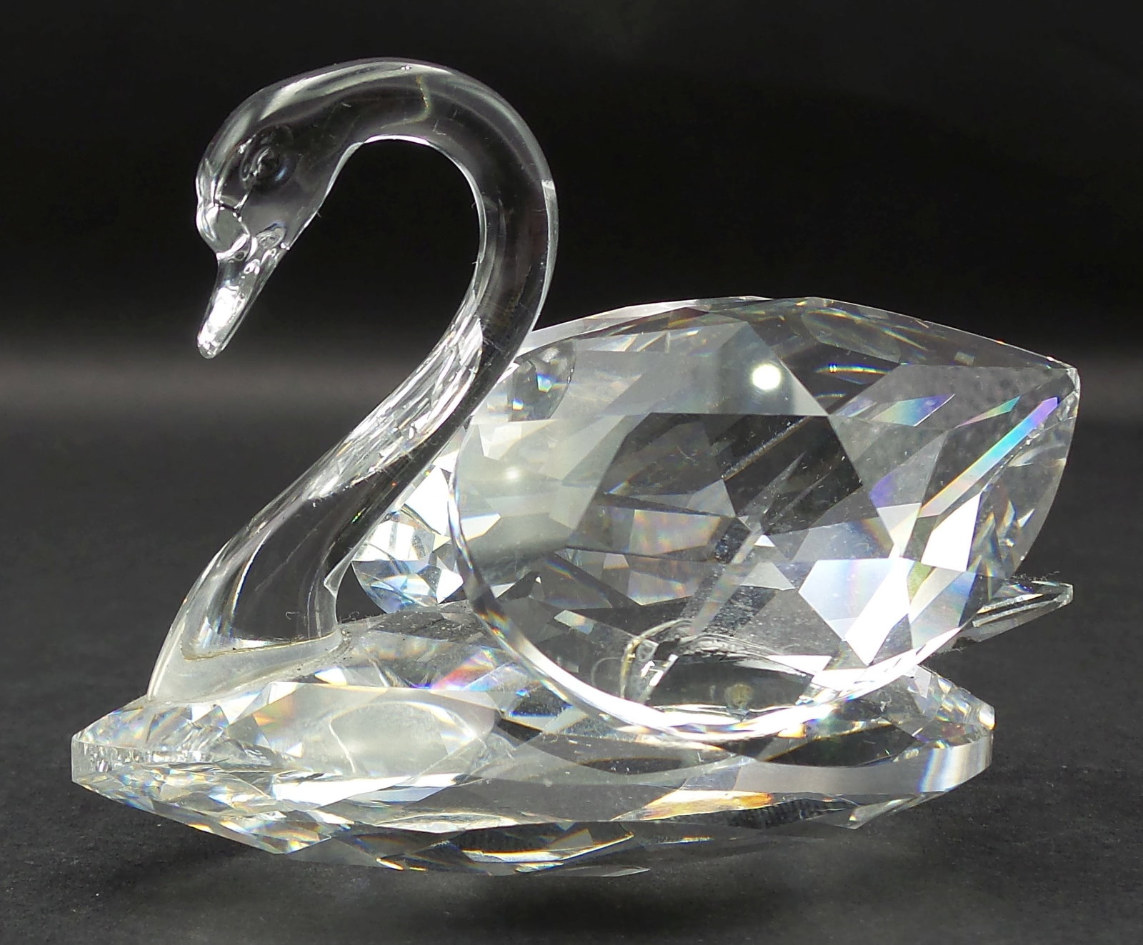 Vintage SWAROVSKI Silver Crystal Swan Figurine: Very good vintage condition; no cracks, or repairs. Very minor flea bite on the back edge. Some dust is making the crystal seem a little dull on the pictures but that can be cleaned away easily. Signe