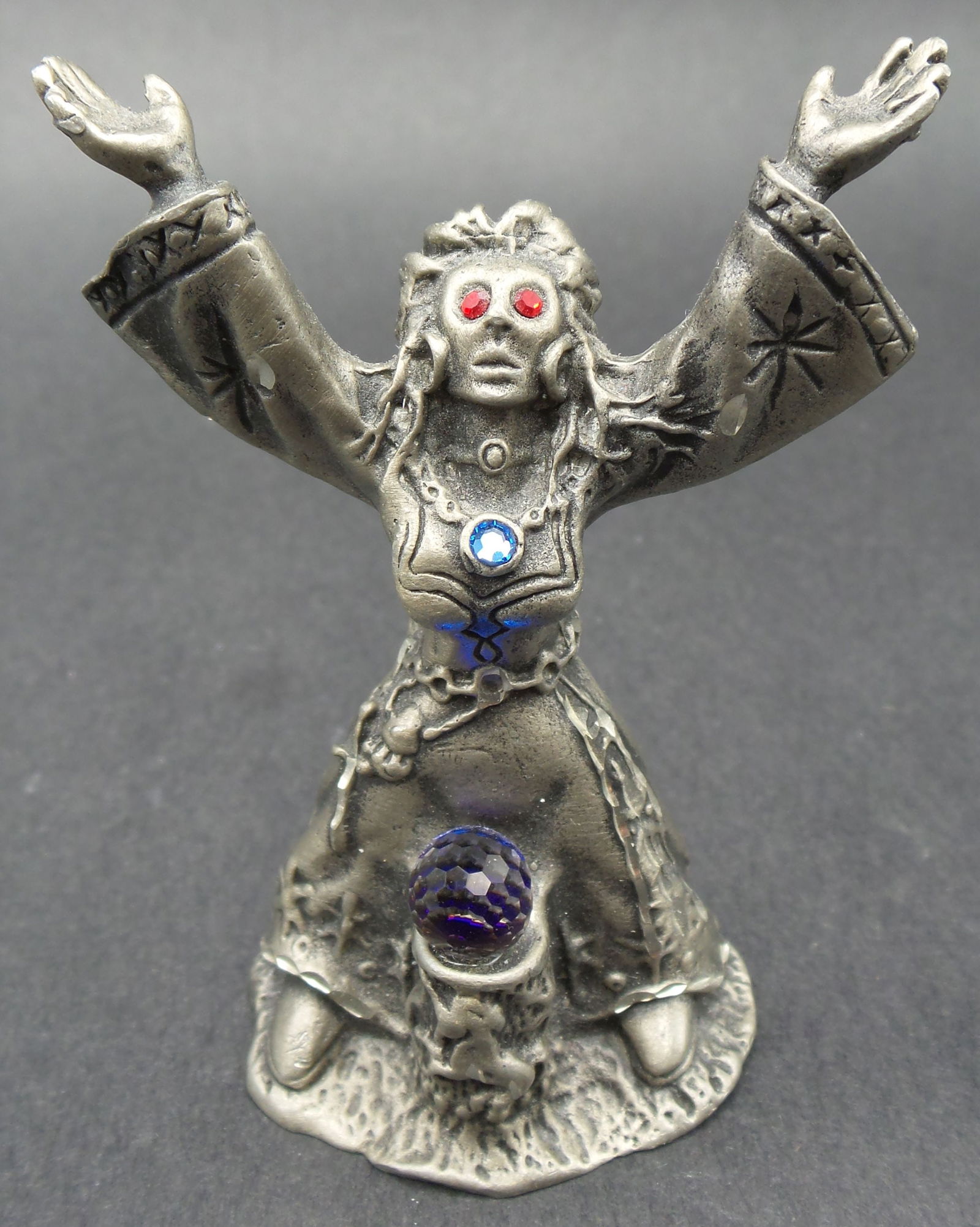 Rare Vintage 1980s MASTERWORKS "Conjuring Witch" Pewter Figurine: Awesome piece with great detail and colorful crystal elements. Very good vintage condition; no damage. Measures approx. 2 3/4" high x 2" wide x 7/8" deep. Marked on the bottom.