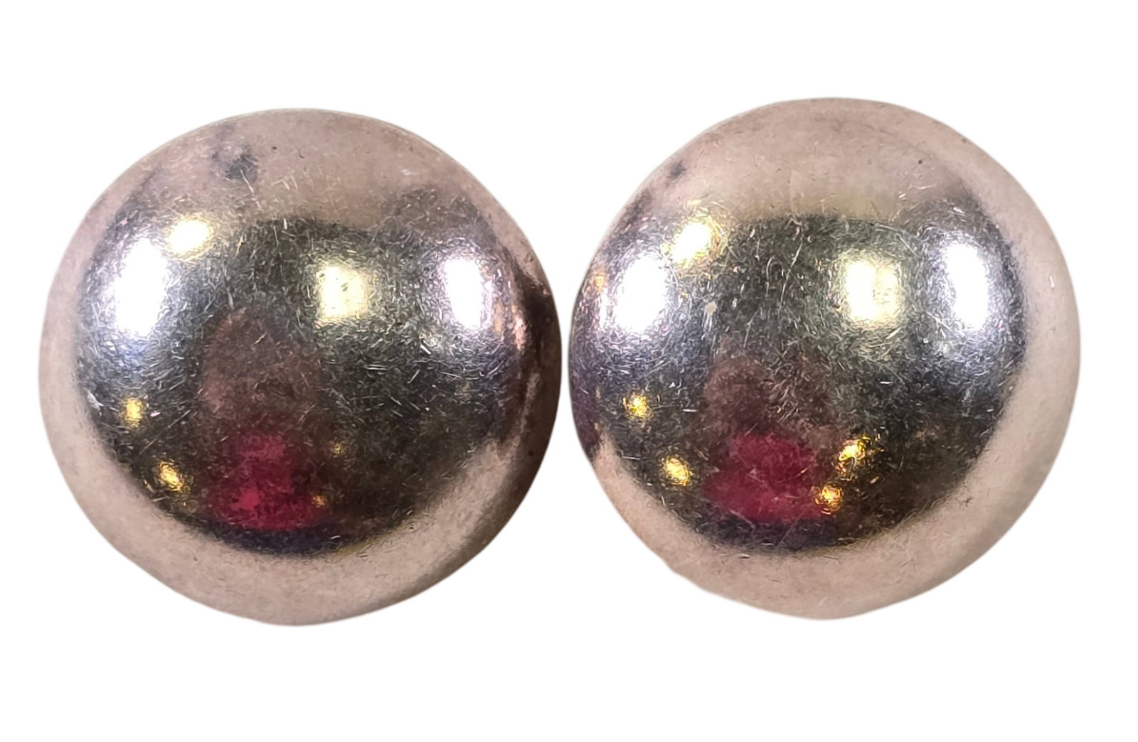 Pair of Vintage Domed Sterling Silver Stud Earrings: Each measures approx. 1" in diameter and weighs ca. 6.1 grams. Very good vintage condition with minor patina and wear according to age. Tested for Sterling Silver. SHIPPING: We ship in-house and charg