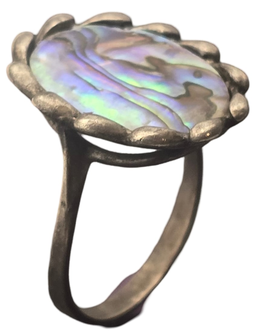 Vintage Sterling Silver & Mother of Pearl Ring: The ring is a size 9 1/2 and weighs ca. 4.1 grams. Very good vintage condition with minor wear and patina according to age. Marked for Sterling Silver. SHIPPING: We ship in-house and charge a flat fee