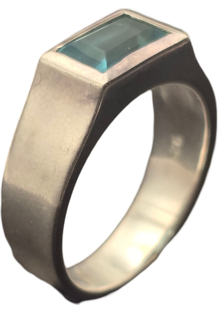 Vintage Sterling Silver & Blue Topaz Designer Ring: The ring is a size 6 1/2 and weighs ca. 4.7 grams. Very good vintage condition with minor wear and patina according to age. Marked for Sterling Silver. SHIPPING: We ship in-house and charge a flat fee