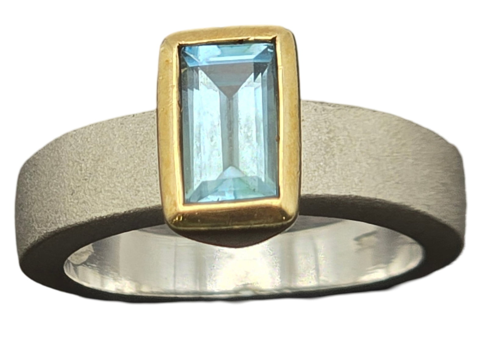 Vintage Modern Partially Gilt Sterling Silver & Blue Topaz Designer Ring: The ring is a size 5 1/2 and weighs ca. 5.3 grams. Very good vintage condition with minor wear and patina according to age. Marked for Sterling Silver. SHIPPING: We ship in-house and charge a flat fee
