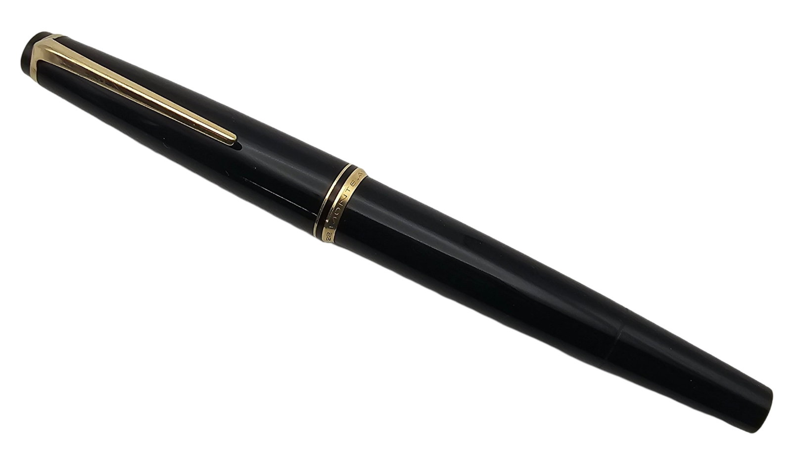 Vintage MONTBLANC Fountain Pen: Very good vintage condition with minor wear according to age. Measures approx. 5" long.