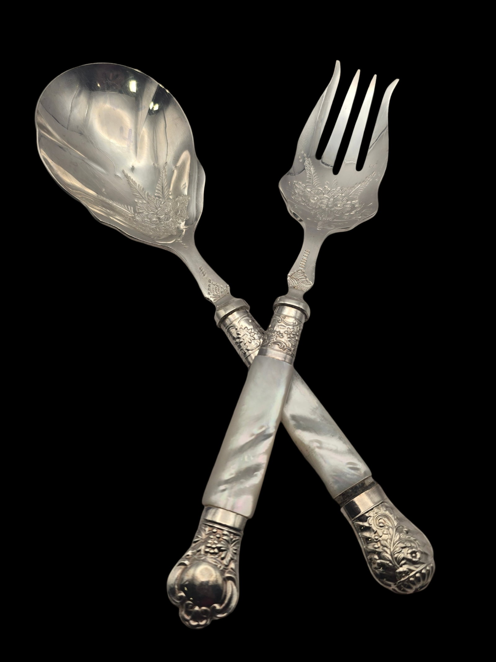 Antique Silverplate & Mother Of Pearl Flora And Fauna Salad Serving Set: Beautiful pieces in very good antique condition with minor patina according to age. Each measures approx. 9 1/2" long. Marked.