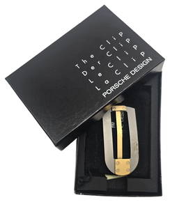 Rare Vintage PORSCHE Design Money Clip in Original Box: Very good vintage condition with very minor wear; comes in the original box. Measures approx. 2 1/2" long and weighs ca. 15.6 grams.