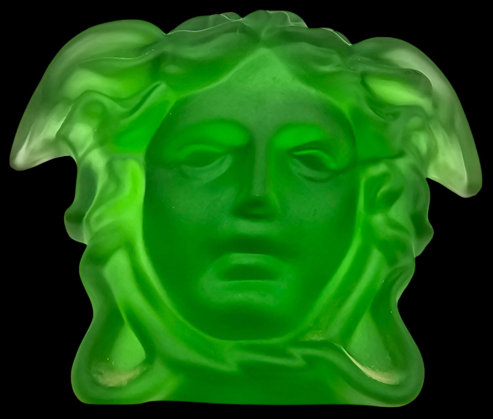 Vintage Versace Green Art Glass Crystal Head Sculpture: Very good vintage condition; no chips, cracks, or repairs.The piece measures approx. 4" wide x 2 3/4" high x 2 1/4" deep.