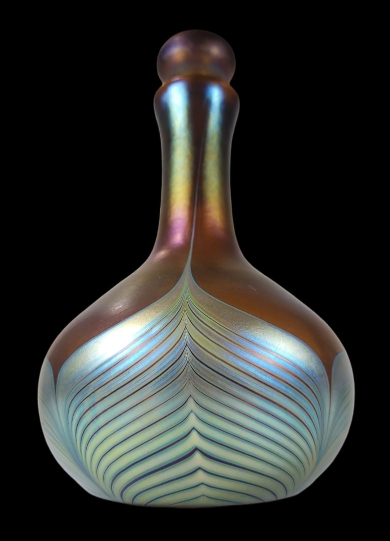 Vintage STEVEN CORREIA Pulled Feather Design iridescent Art Glass Decanter: Very good vintage condition; no chips, cracks, or repairs. Measures approx. 9 1/2" high x 6" in diameter. Signed on the bottom; original sticker.