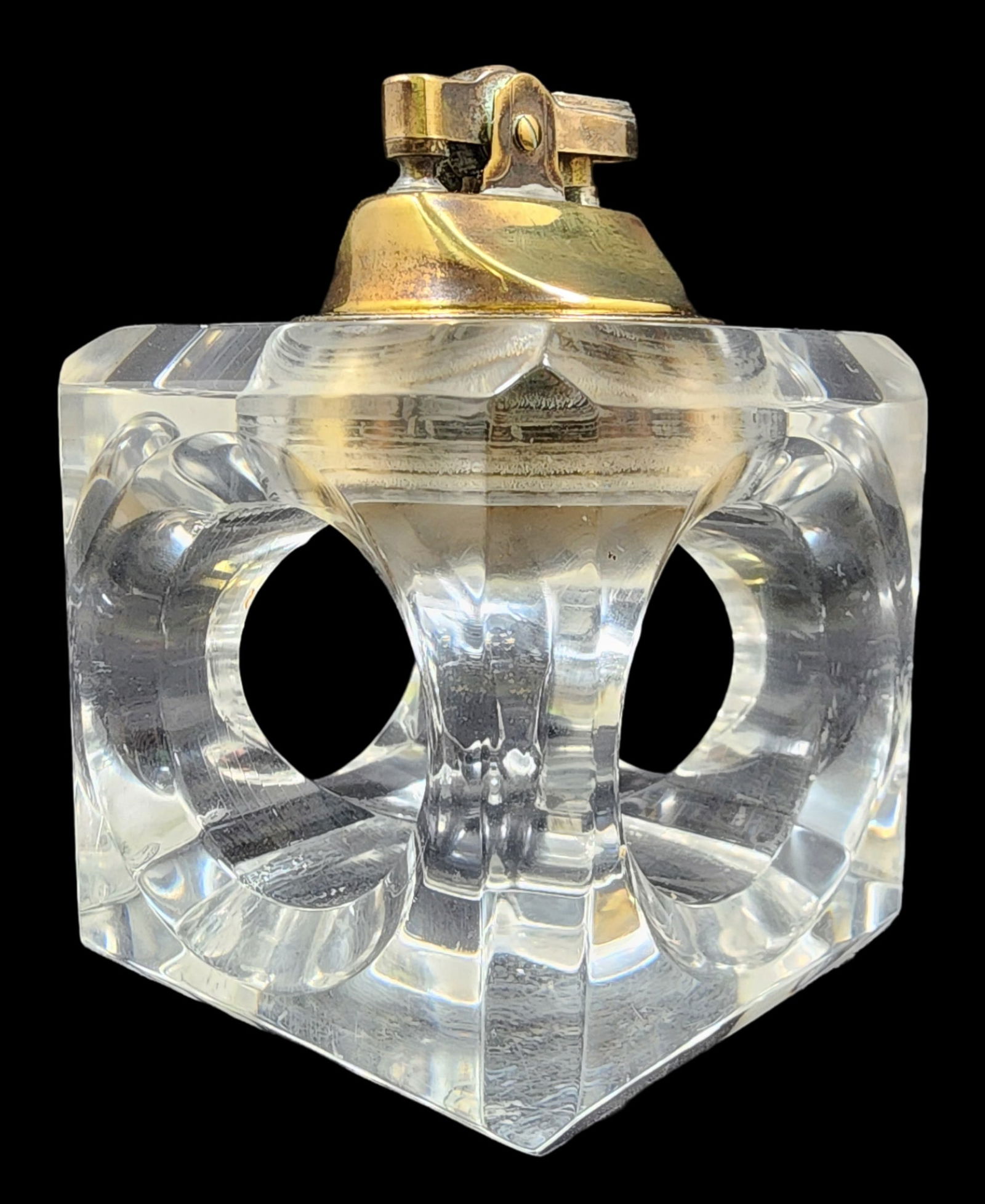 Stylish Vintage Mid-Century Modern Lighter in Lucite Frame: Very stylish piece in good vintage condition with some scratching on the underside. Untested. Measures approx. 3 3/4" high x 2 3/4" long x 2 3/4" wide.