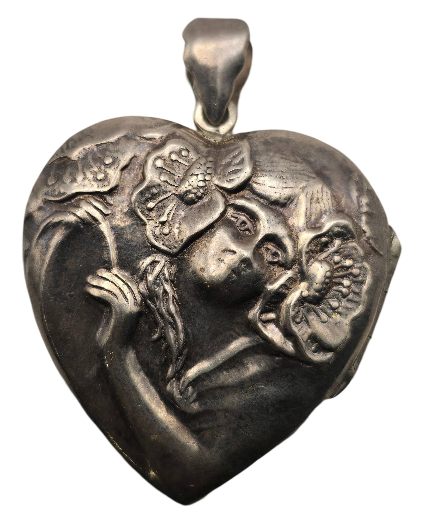 Antique Art Nouveau Heart Shaped Sterling Silver Locket Pendant: Very good vintage condition with some patina and wear according to age. Measures approx. 1 1/2' long and weighs ca. 10.33 grams. Marked for Sterling Silver. SHIPPING: We ship in-house and charge a fla