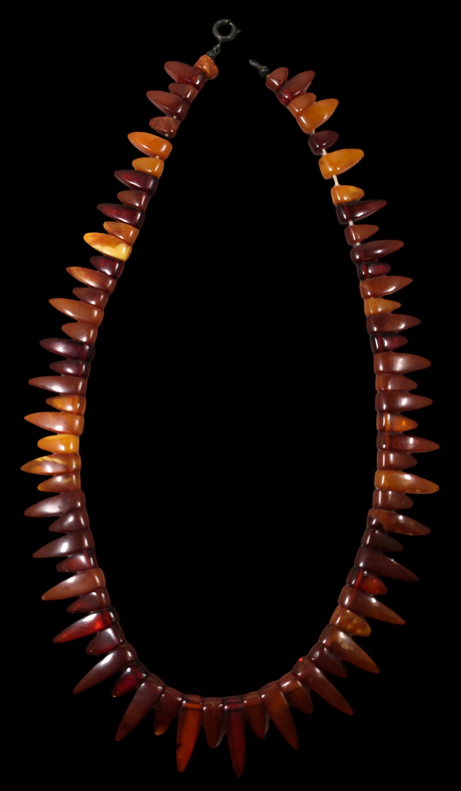 Very Unusual Vintage European Baltic Amber Necklace: Very good vintage condition with some patina according to age, please see pictures. Measures approx. 8" long.