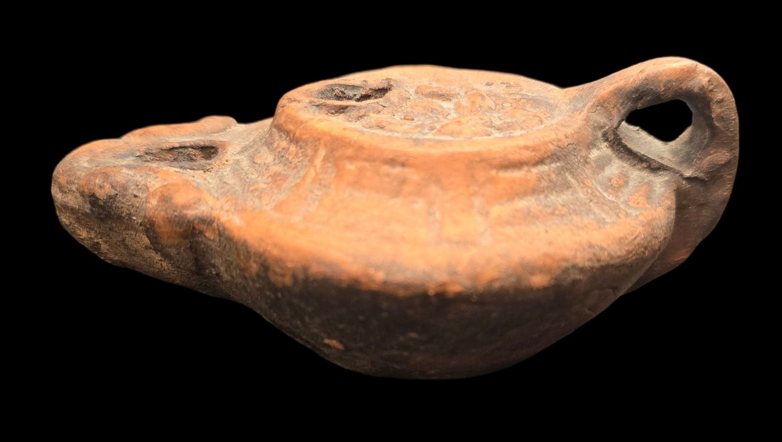 Vintage Roman Style Terracotta Oil Lamp: Very good vintage condition with minor wear according to age, please see pictures. No cracks or repairs. Measures approx. 2" high x 4 1/2" wide.