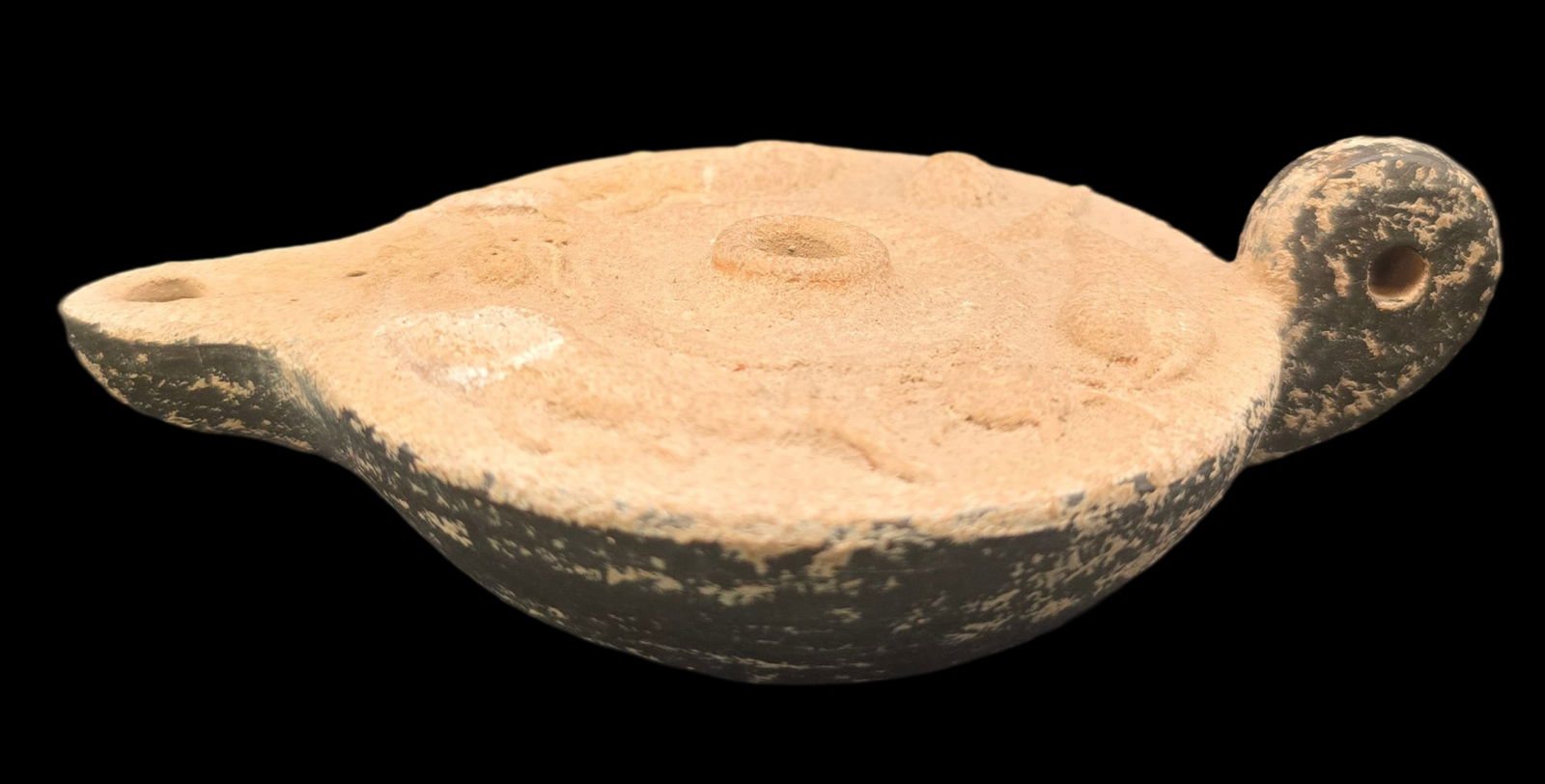 Vintage Roman Style Terracotta Oil Lamp: Very good vintage condition with minor wear according to age, please see pictures. No cracks or repairs. Measures approx. 2" high x 6 1/2" wide.